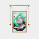 The Eterna Classics Zeus Replica Portrait by Giant Sculptures features a portrait with curly hair and a beard, abstract green and black geometric shapes as the background, and is elegantly displayed in a golden frame with a minimalistic suspension system and two spherical weights.