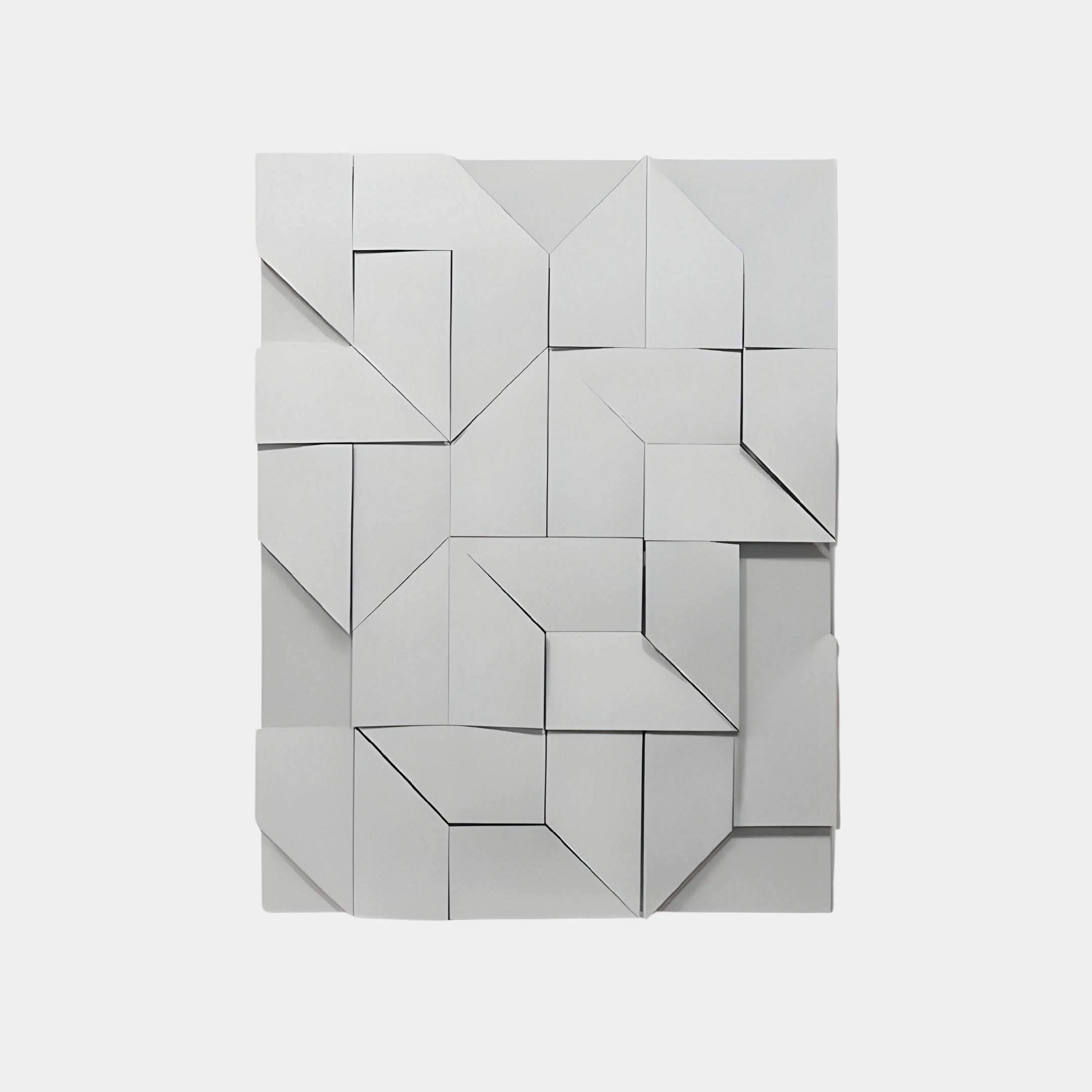 The Prisma White Geometric Panel 3D Wall Art by Giant Sculptures features interlocking shapes creating a striking three-dimensional effect. Ideal for minimalist decor, this modern piece stands out beautifully against a plain background with its varying depths and angles.