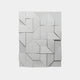 The Prisma White Geometric Panel 3D Wall Art by Giant Sculptures features interlocking shapes creating a striking three-dimensional effect. Ideal for minimalist decor, this modern piece stands out beautifully against a plain background with its varying depths and angles.