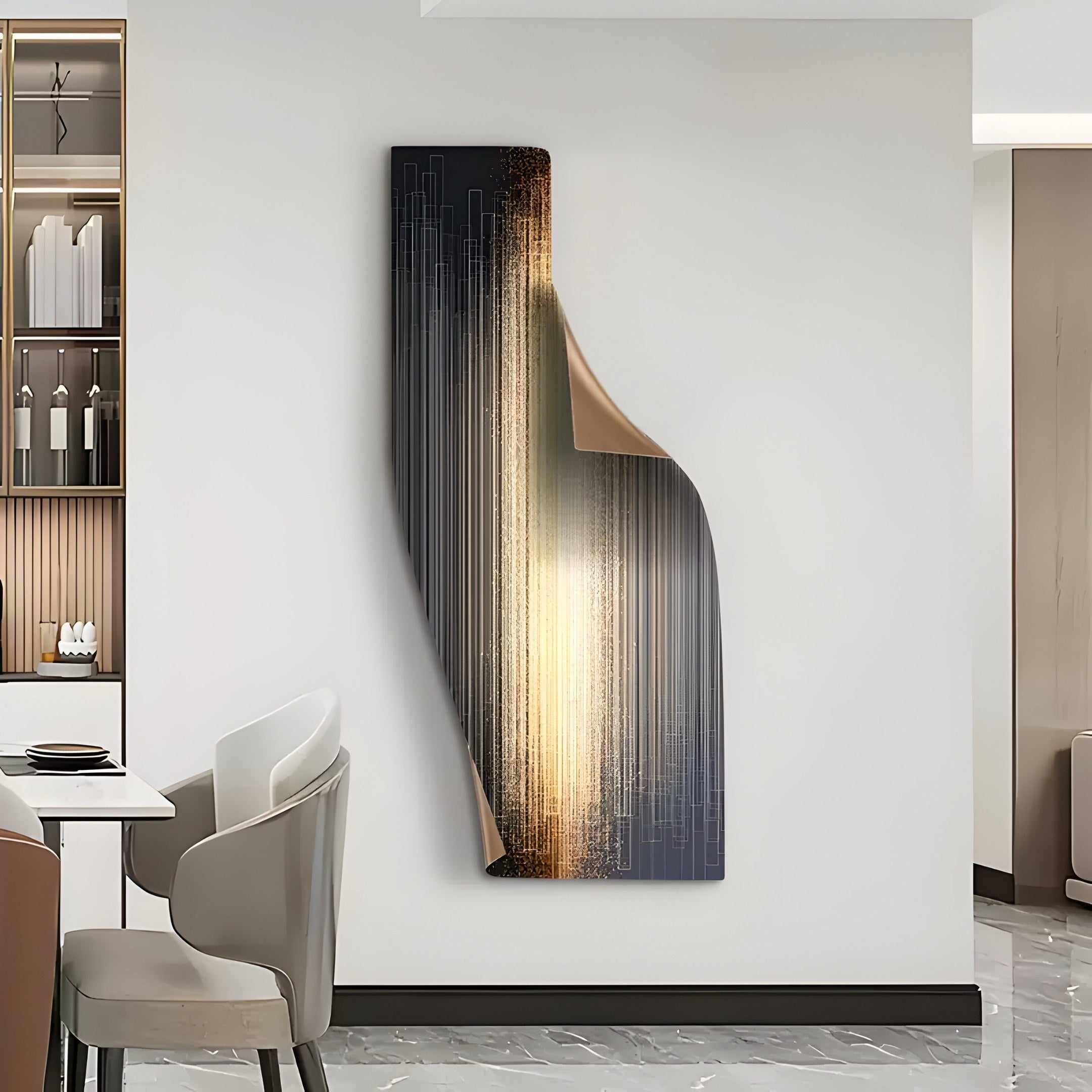 Displayed in a minimalist dining room with a white table, beige chairs, and elegant decor, the Giant Sculptures Celestial Gold Radiance Curved Angled Abstract Metal Wall Art features a glossy surface with gold streaks emerging from behind a dark panel.