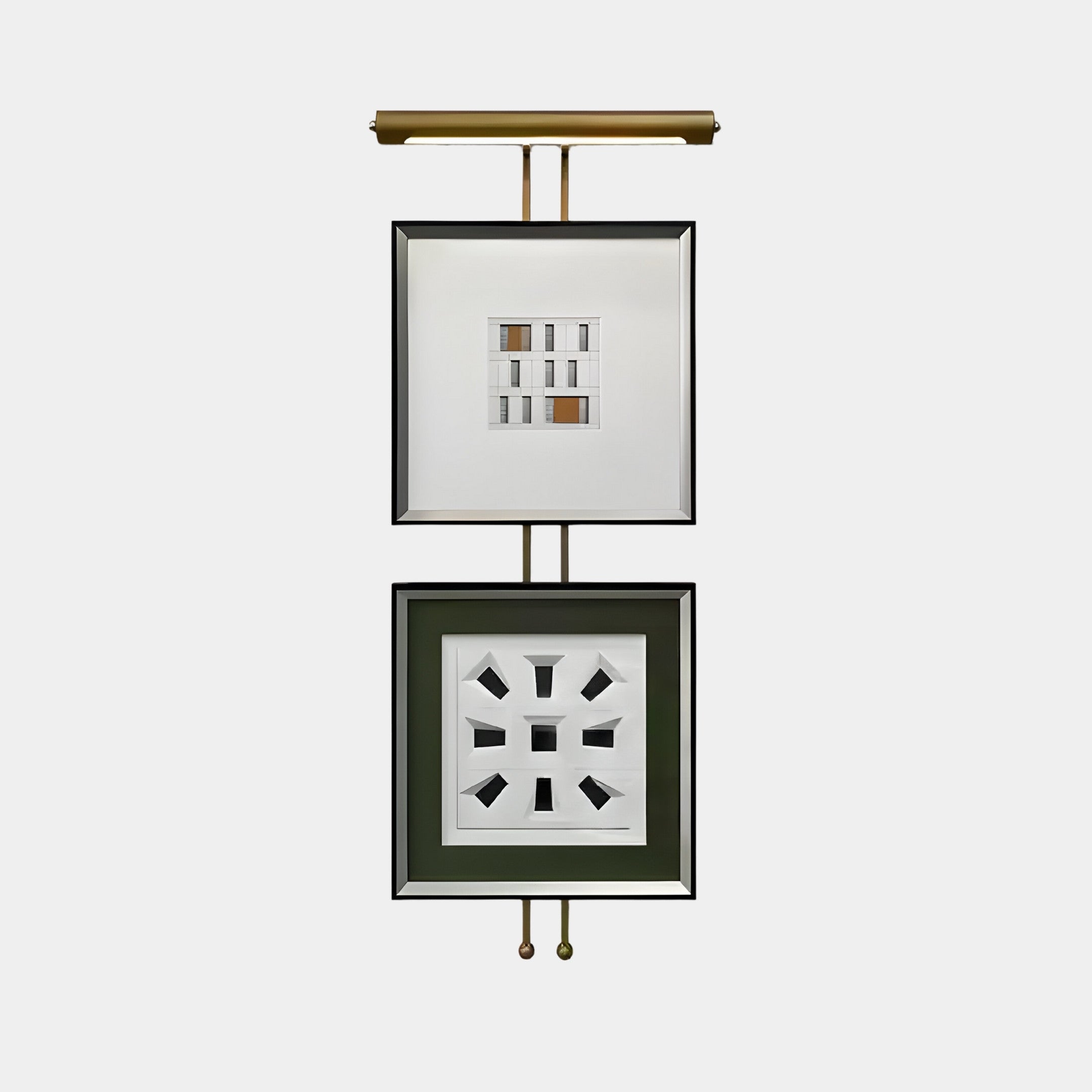 Two pieces of Artisera Grid Motif Contemporary Dual Frame Built-In Light Wall Art by Giant Sculptures hang vertically, illuminated by a brass picture light, with one featuring a grid pattern and the other displaying geometric precision and symmetrical design for modern elegance.