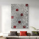 Giant Sculptures Prismatica Red & Silver Mosaic 3D Wall Art hangs on a white wall above a modern gray sofa with two gray cushions and a central red one. A small plant is nearby, and a round lamp adorns the low table.