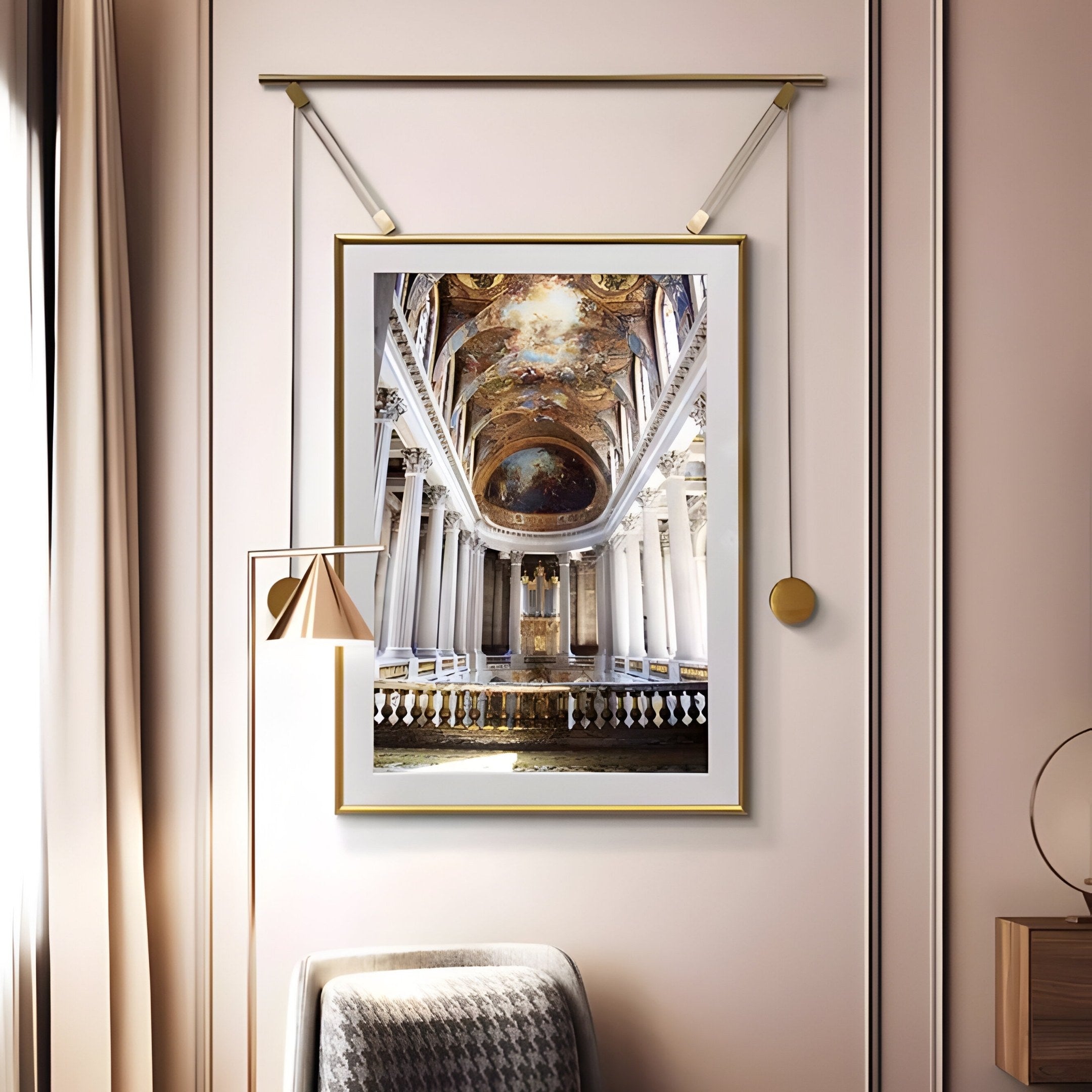 The Aristo Grand Cathedral Painting by Giant Sculptures, featuring a gold frame and ornate chapel with a painted ceiling, hangs on a cream-colored wall, perfectly complementing the nearby modern lamp and patterned upholstery chair.