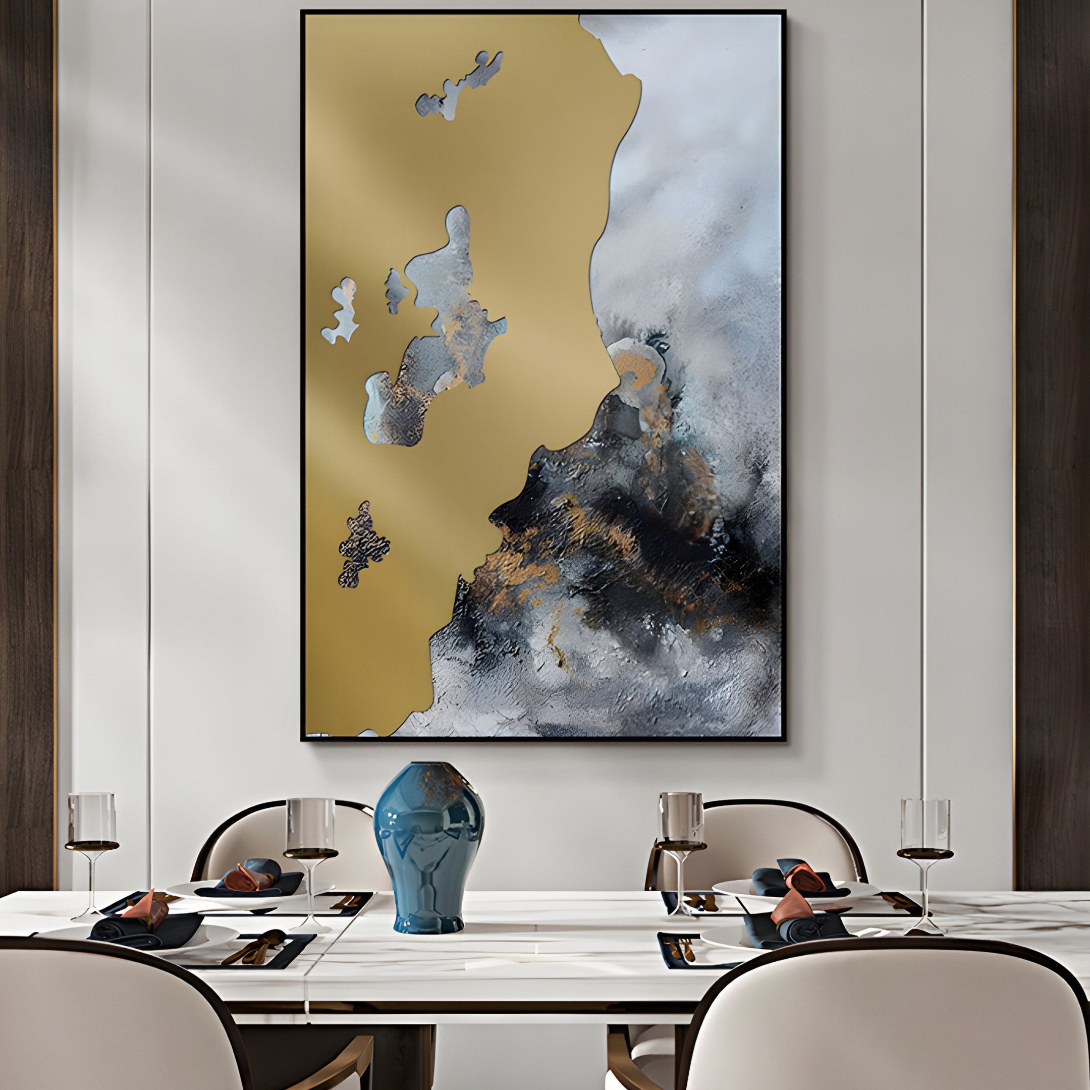 A modern dining room features the Astrid Gold Veil Textured Abstract Wall Art by Giant Sculptures. The table is set for four with black and orange accents, a blue vase centerpiece, two wine glasses per setting, and Astrid Gold Veil-patterned napkins.