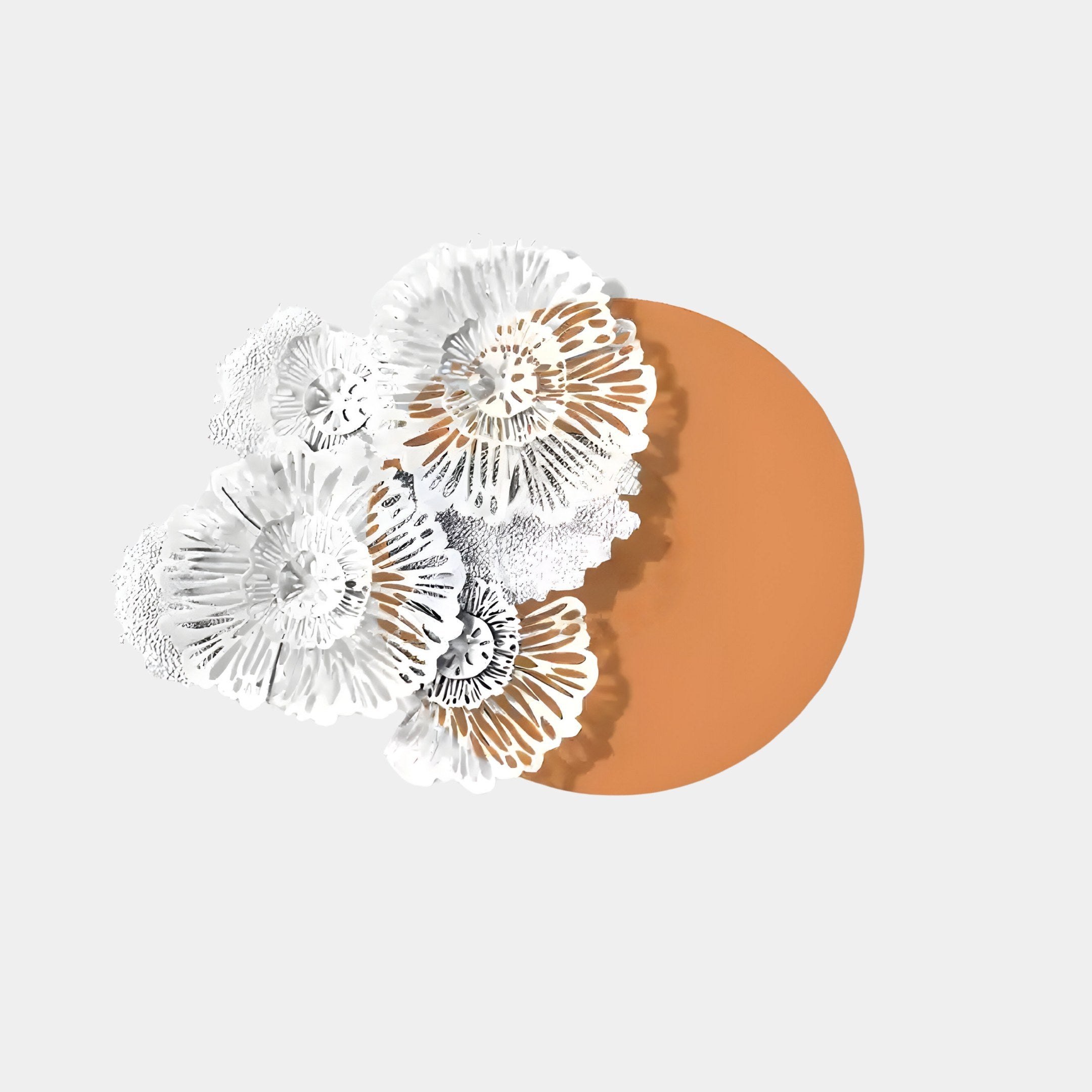 The Fleur Halo Terracotta Round White Metal Floral Decorative Wall Art by Giant Sculptures showcases intricately designed white flowers with lace-like patterns overlapping a large brown circle on a light gray background, creating stunning floral wall art.