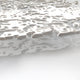 Macro view of embossed silver textures on a decorative wall panel, highlighting artistic precision and smooth finishes.