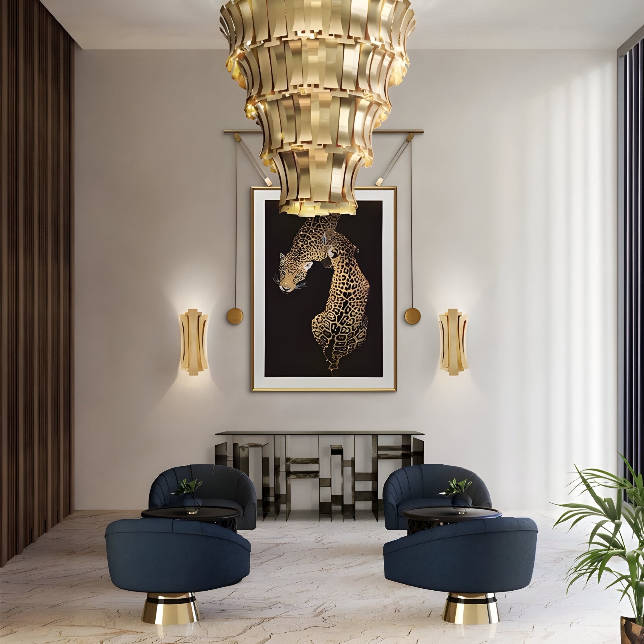 A modern living room with luxury decor features the Glacia Dual Jaguar Crystal Hanging Framed Wall Art by Giant Sculptures, a luxurious chandelier, two blue armchairs flanking small black tables, and a geometric console enhancing the minimalist design with neutral tones and wood accents.