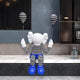 A Deep Blue Iconify Mime Sitting Sculpture (70cm) from Giant Sculptures, featuring large ears and blue shoes, sits on a marble ledge with two striped balloons. Its striped attire contrasts beautifully against contemporary interiors with modern shelves and a decorative jar in the background.