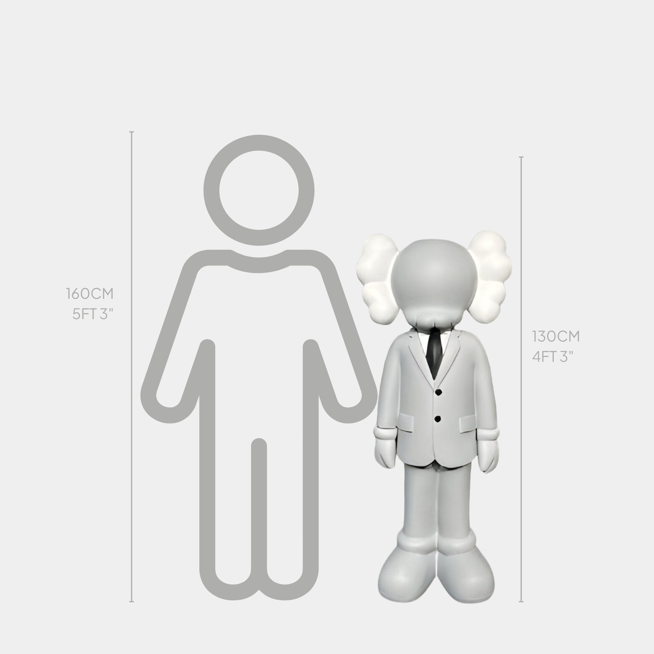 The Giant Sculptures Soft Grey Suit Iconify Director Sculpture stands 130 cm tall beside a 160 cm silhouette on a height chart. The modern artistry of this unique resin piece is highlighted against a plain white background.