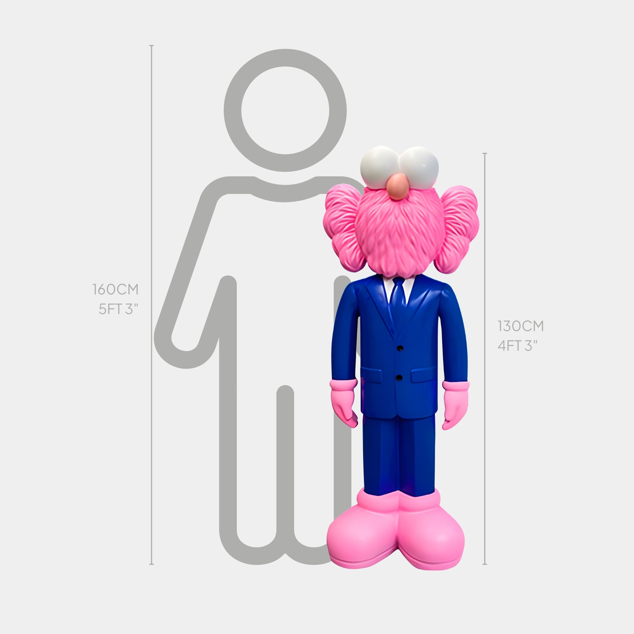 The Cobalt Blue Suit Iconify CEO Sculpture by Giant Sculptures is a pink cartoon character embodying modern leadership, standing 130 cm tall beside a generic outline at 160 cm.