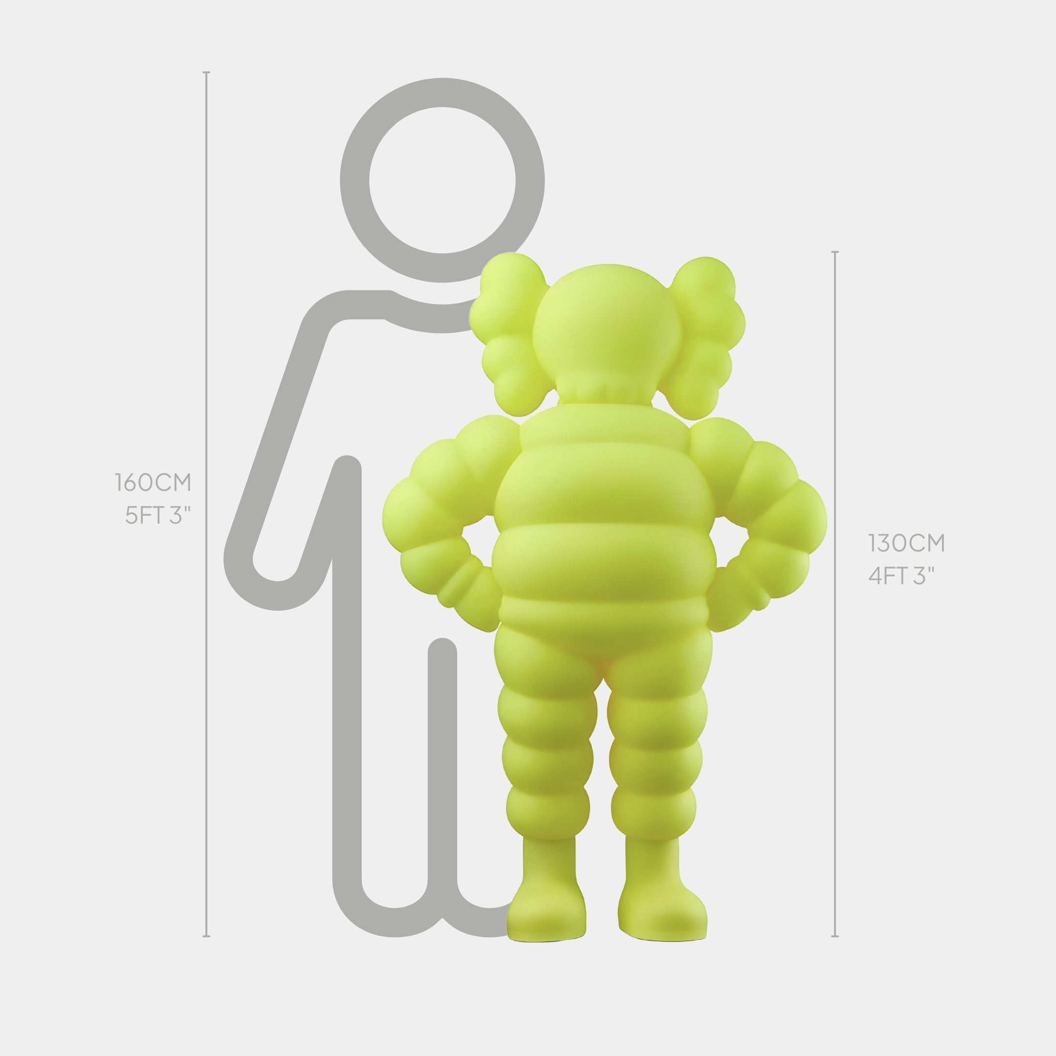 The Citrus Yellow Iconify Rollo Warrior Sculpture by Giant Sculptures is a lime-green, abstract humanoid figure with round shapes. Standing at 130 cm (4 ft 3 in), it contrasts with a gray silhouette of 160 cm (5 ft 3 in), hinting at its pop-art influence.