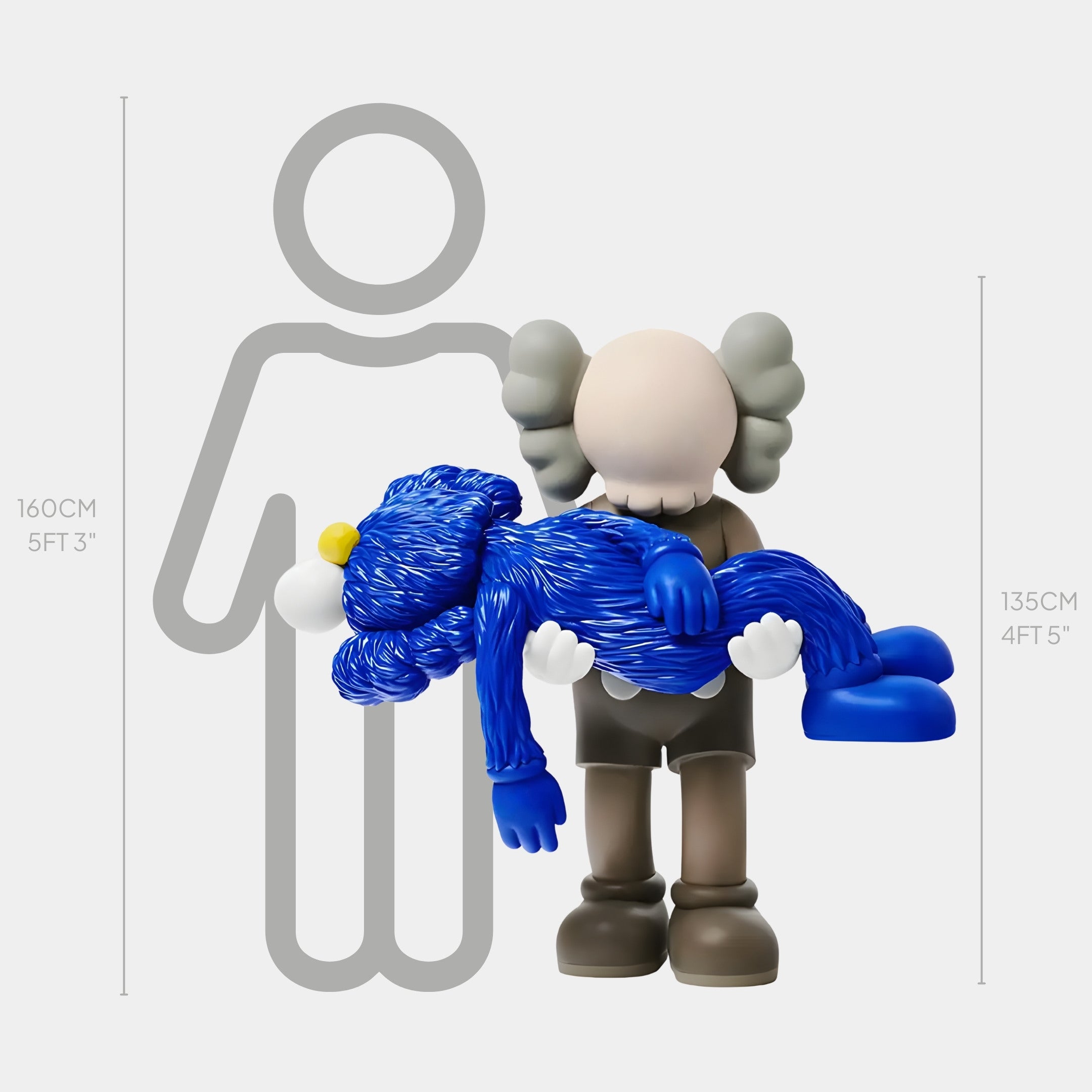 An X-eyed head figure is rescuing a Royal Blue Iconify sculpture by Giant Sculptures. The taller figure stands at 160 cm (5 ft 3 in) and the shorter, furry blue icon is 135 cm (4 ft 5 in). Both are crafted from high-quality resin, exuding a minimalist cartoon style.