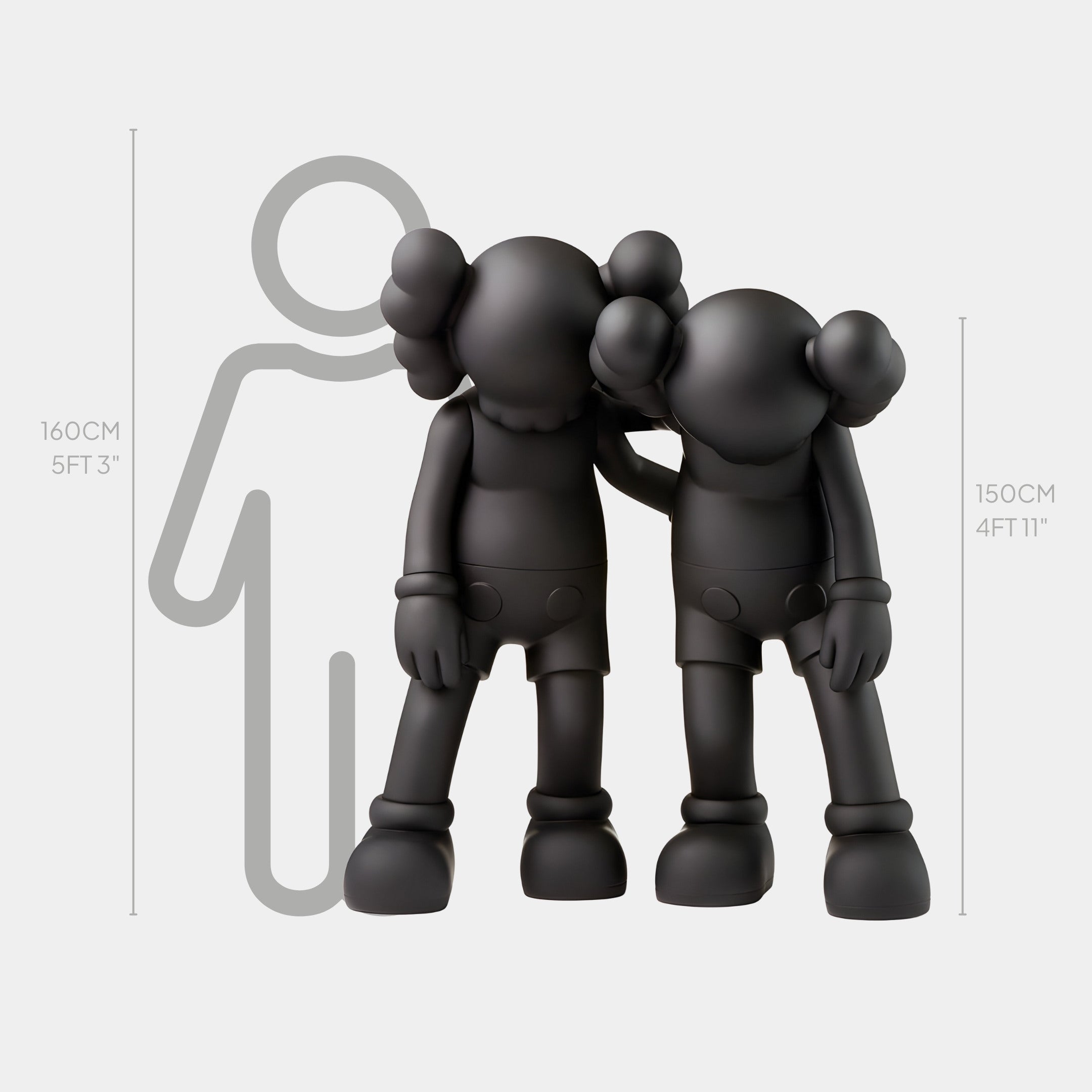 The Giant Sculptures Midnight Black Iconify Friendship Sculpture, standing at 150 cm (4 ft 11 in), features two black cartoon figures with round ears in an embrace before a height chart. A taller outline at 160 cm (5 ft 3 in) is visible behind them, evoking unity and connection.