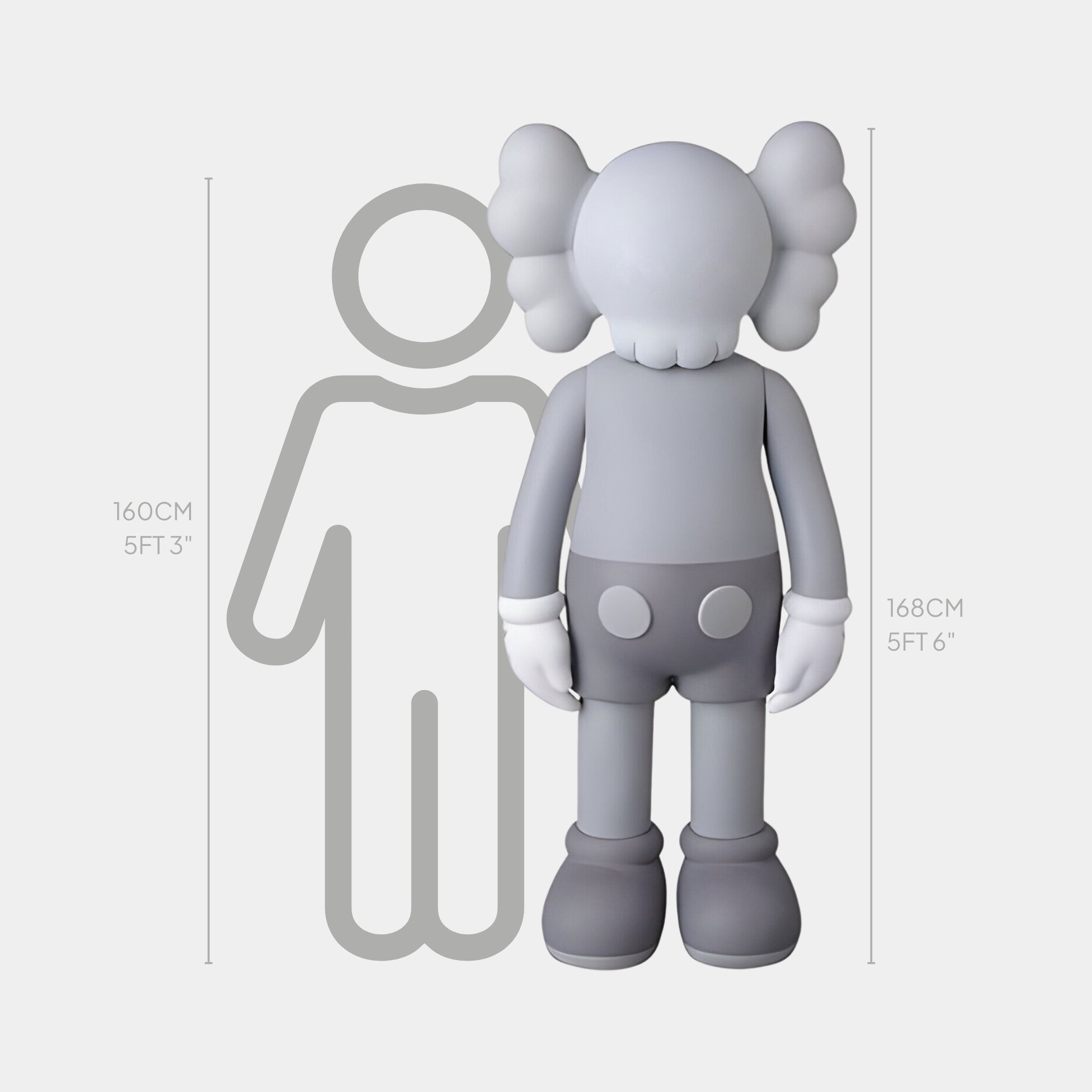 The Slay Grey Iconify Standing Sculpture by Giant Sculptures is a 168 cm tall cartoon-style grey figure with gloved hands and a cross-eyed head that stands before a human outline. It combines humor and scale, making it perfect for modern interiors or contemporary decor.