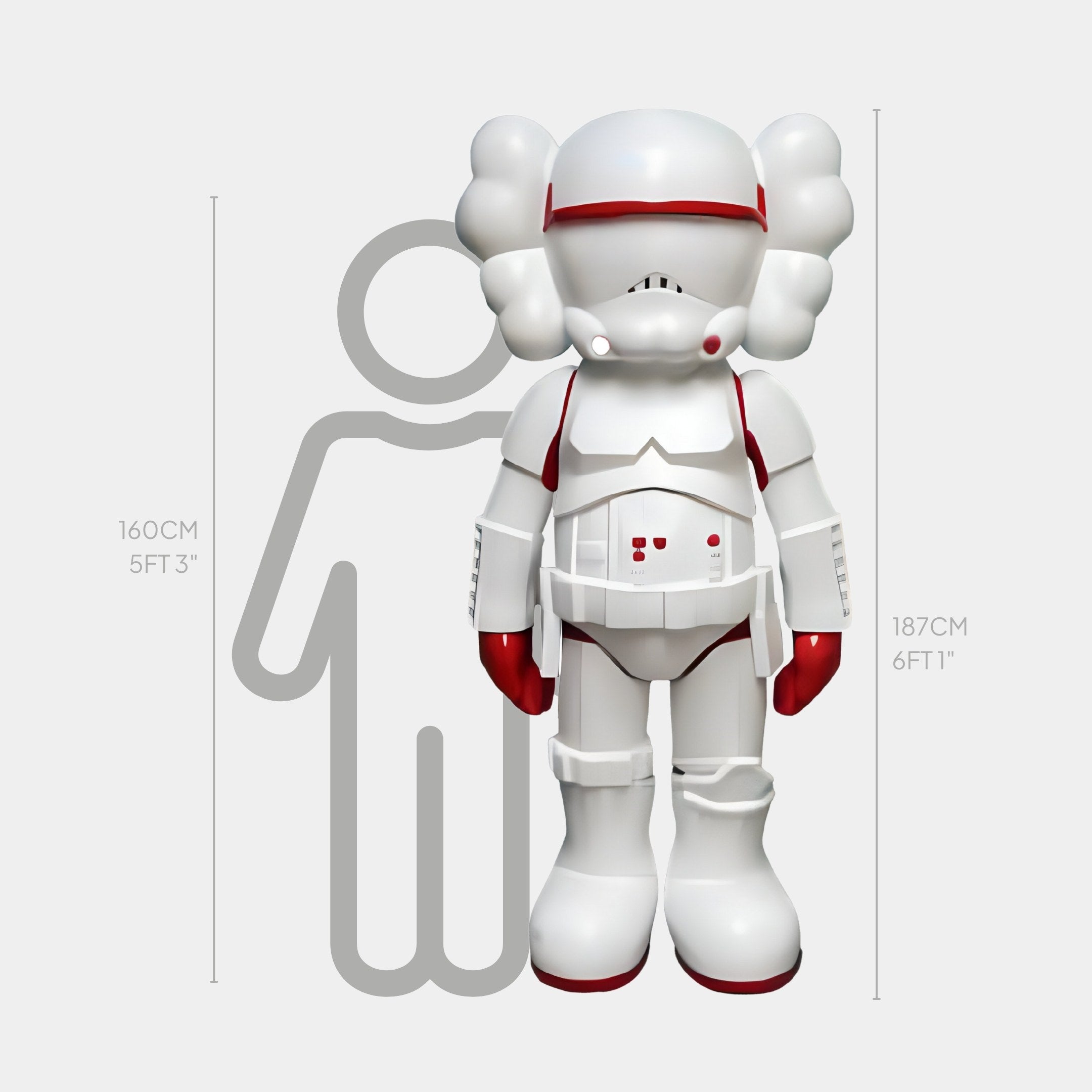 A white and red astronaut-like figure stands beside a human silhouette for size comparison, showcasing the modern design of the Red Iconify Enforcer Sculpture by Giant Sculptures. Standing at 187cm (6ft 1in), its an ideal striking centerpiece for contemporary living rooms.