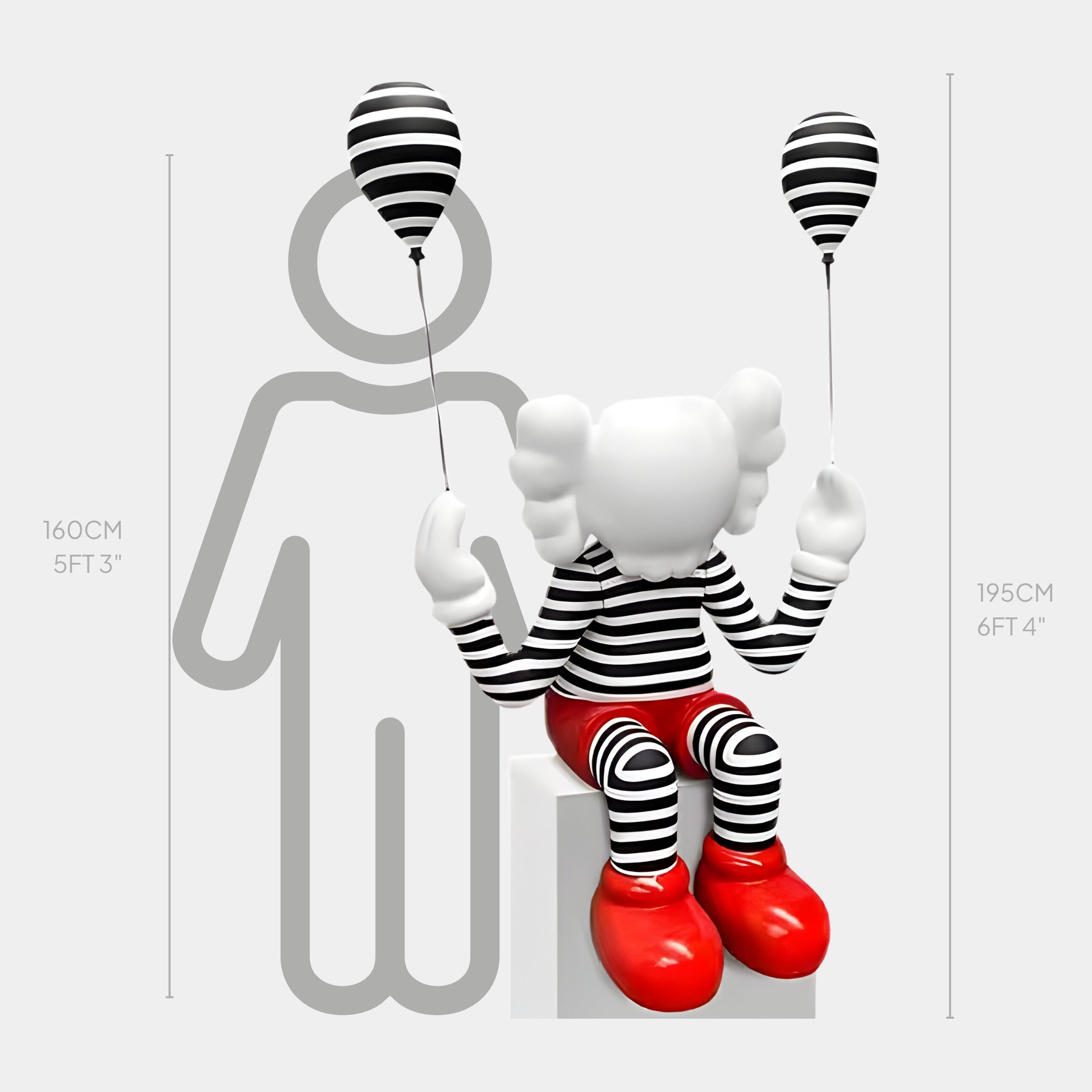 The Lustrous Red Iconify Mime Sitting Sculpture by Giant Sculptures stands at 195cm, wearing a black and white striped outfit and red shoes, seated on a block holding two balloons. Its cartoonish style complements modern interiors with an artistic size-comparison silhouette.