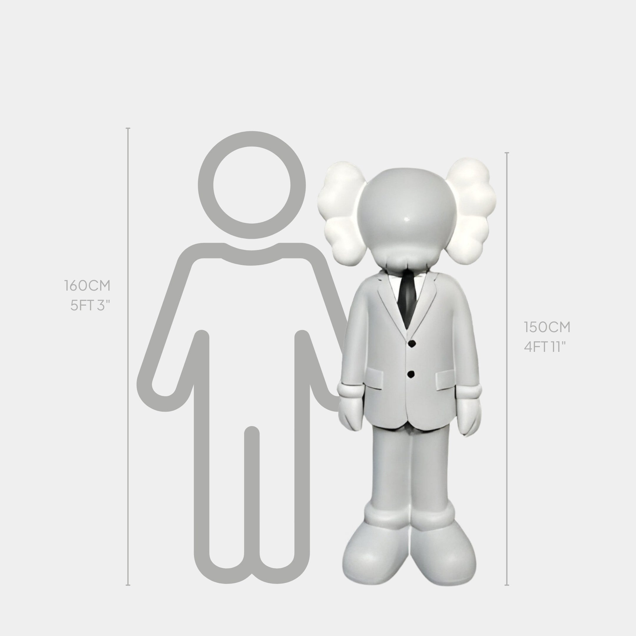 A 150 cm Soft Grey Suit Iconify Director Sculpture by Giant Sculptures, featuring a stylized figure in a white suit and black tie with puffy ears, stands next to a 160 cm gray outline.