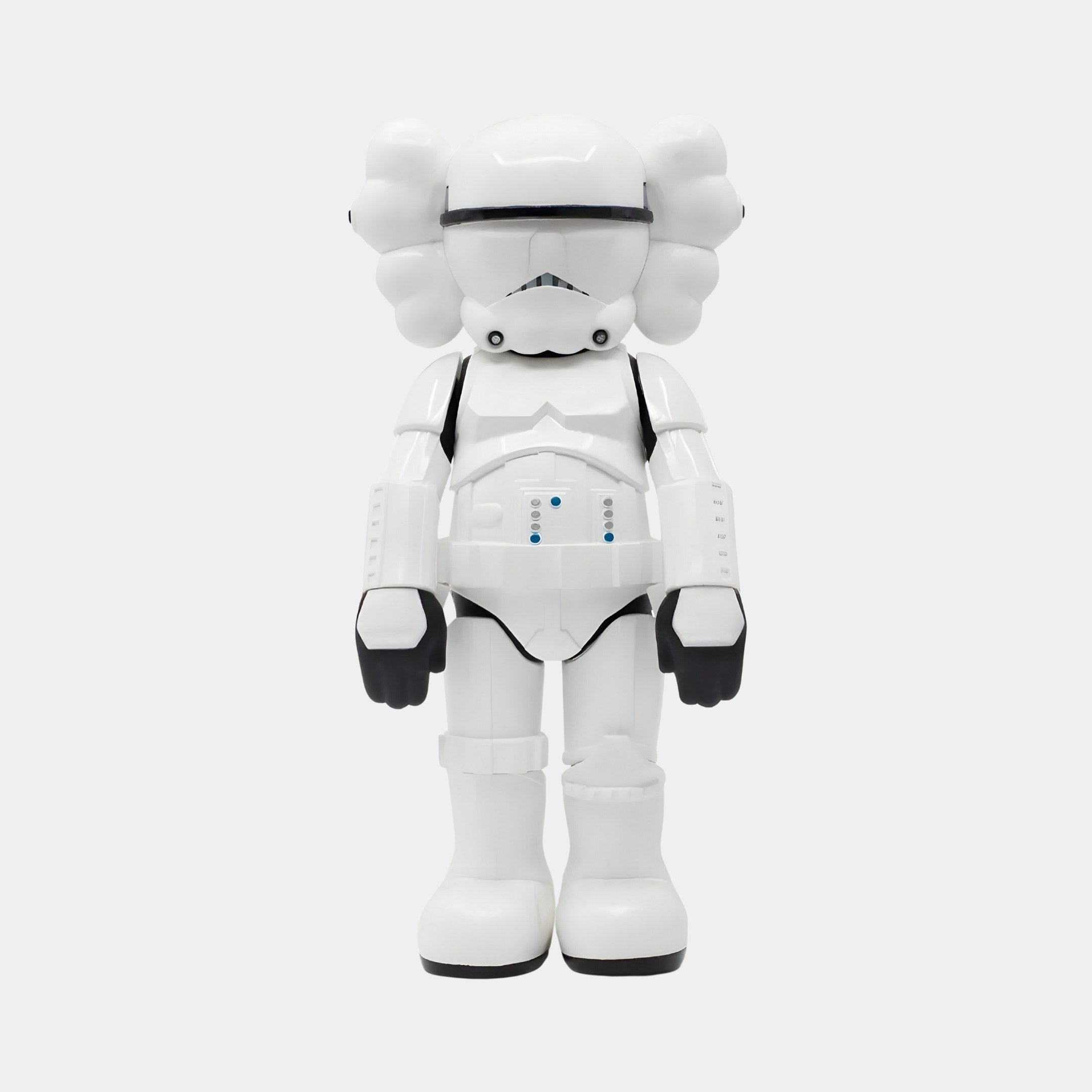 The Black & White Iconify Enforcer Figure by Giant Sculptures is a stylized 26cm toy resembling a Stormtrooper, featuring a dual-tone design with distinctive round helmet and puffy ears. It has black gloves and details and stands against a plain gray background, ideal for contemporary art collections.