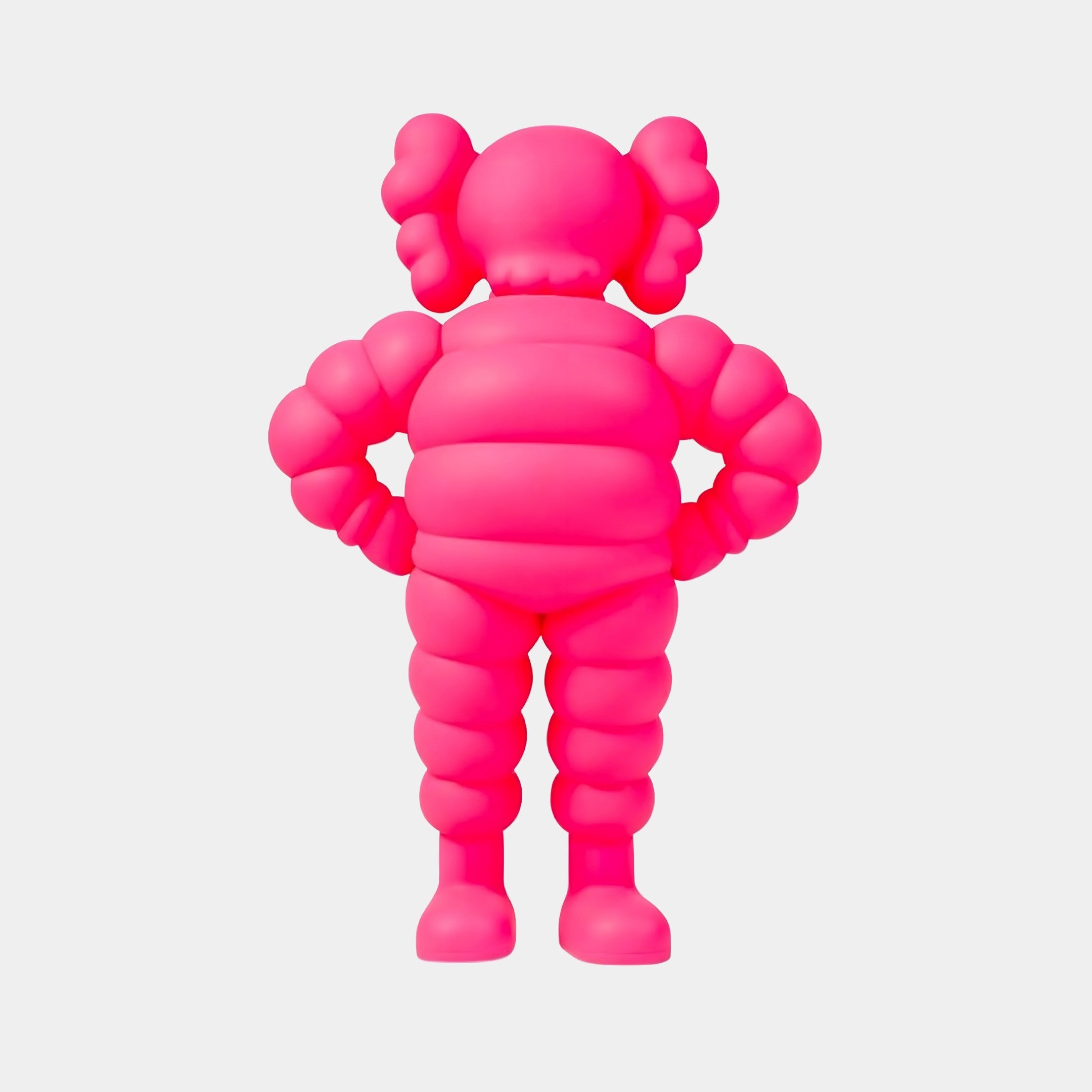 Standing on a white background, the Electric Pink Iconify Rollo Warrior Sculpture by Giant Sculptures, at 80cm tall, embodies Pop-Art Style with its bright pink color, puffy cartoon design, large round ears, segmented limbs and playful stance.