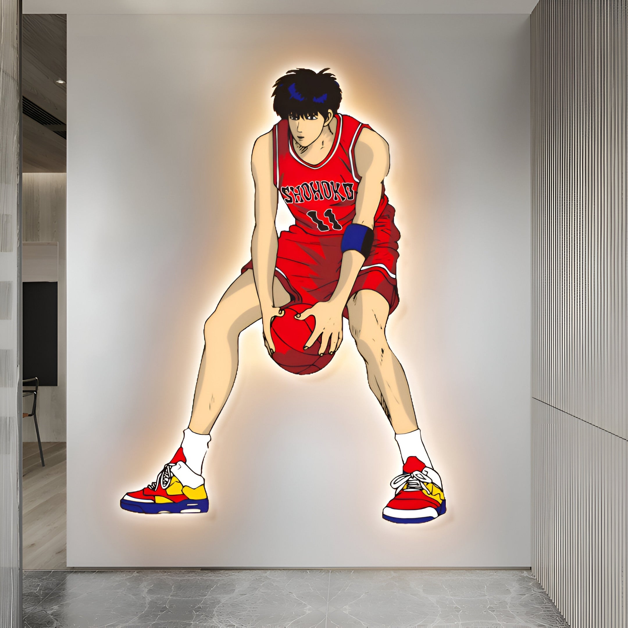 The Enlustra IV Game On UV LED Wall Art by Giant Sculptures features a large anime-style basketball player in red and blue, dribbling with colorful sneakers. This vibrant mural illuminates against any modern interior wall, enriching contemporary décor.