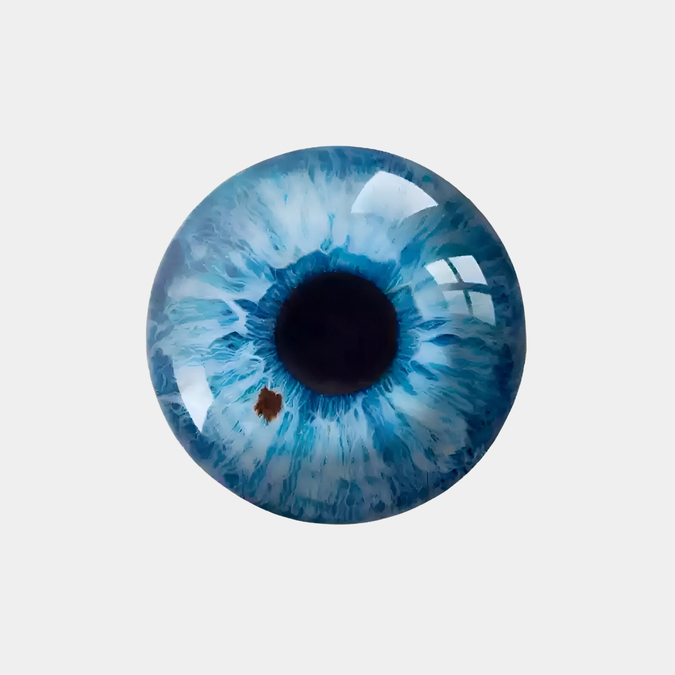 A close-up of a blue eye with intricate iris patterns and a small brown spot mirrors modern artistry. The glossy eye reflects light against a gray backdrop, reminiscent of Giant Sculptures Genesis Iris 3D Resin Crystal Porcelain LED Wall Art.