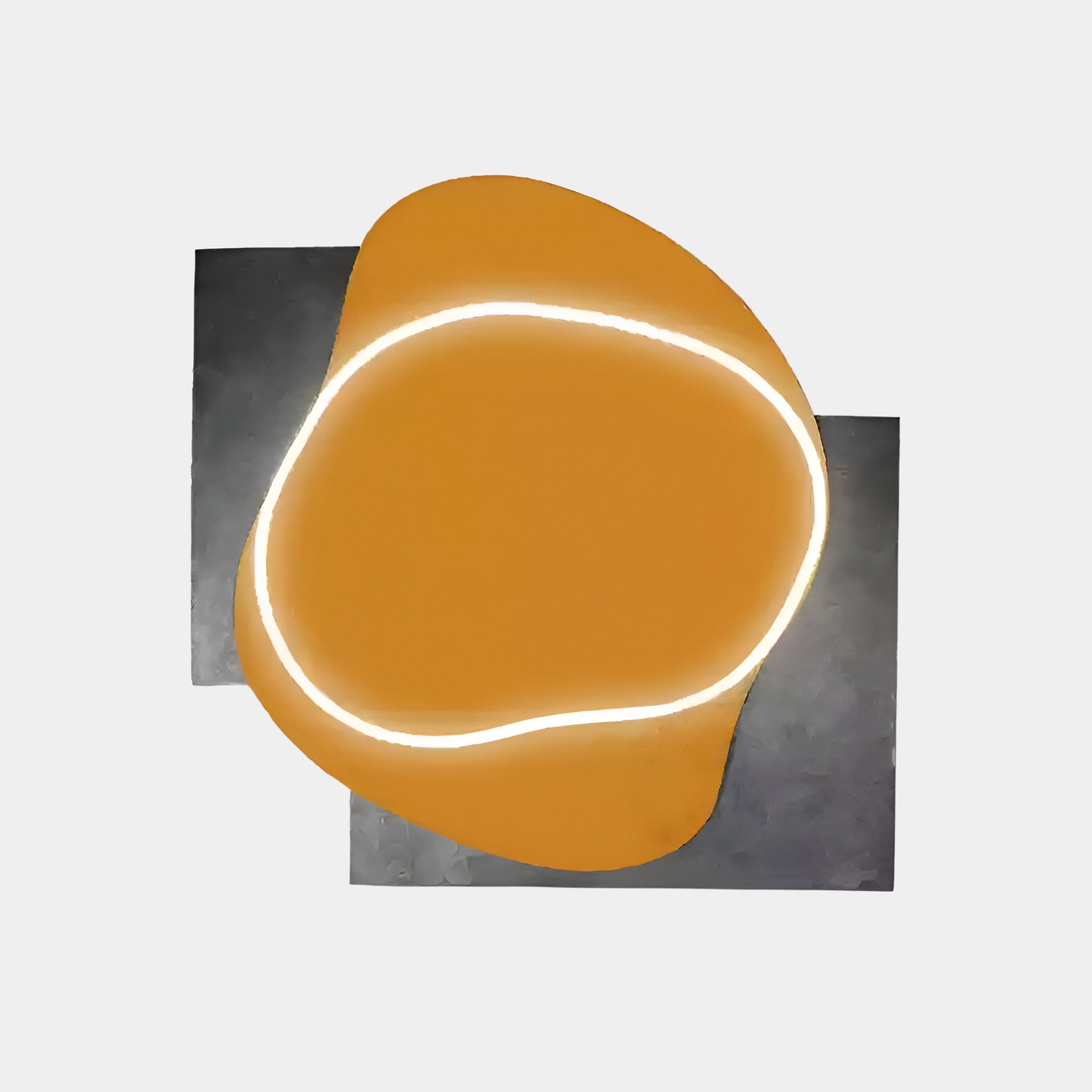 Giant Sculptures Gleam Amber Glow 3D Leather LED Wall Art showcases an abstract design with an orange blob on a dark gray rectangle, accentuated by a white LED light outline, offering a modern and minimalistic look.