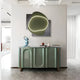 A modern interior features a pale green console table against a white wall, topped with books and decor. Above, Giant Sculptures Gleam Olive Serenity 3D Leather LED Wall Art with abstract glowing lines adds intrigue. The marble floor gleams as natural light flows in from an adjacent room.