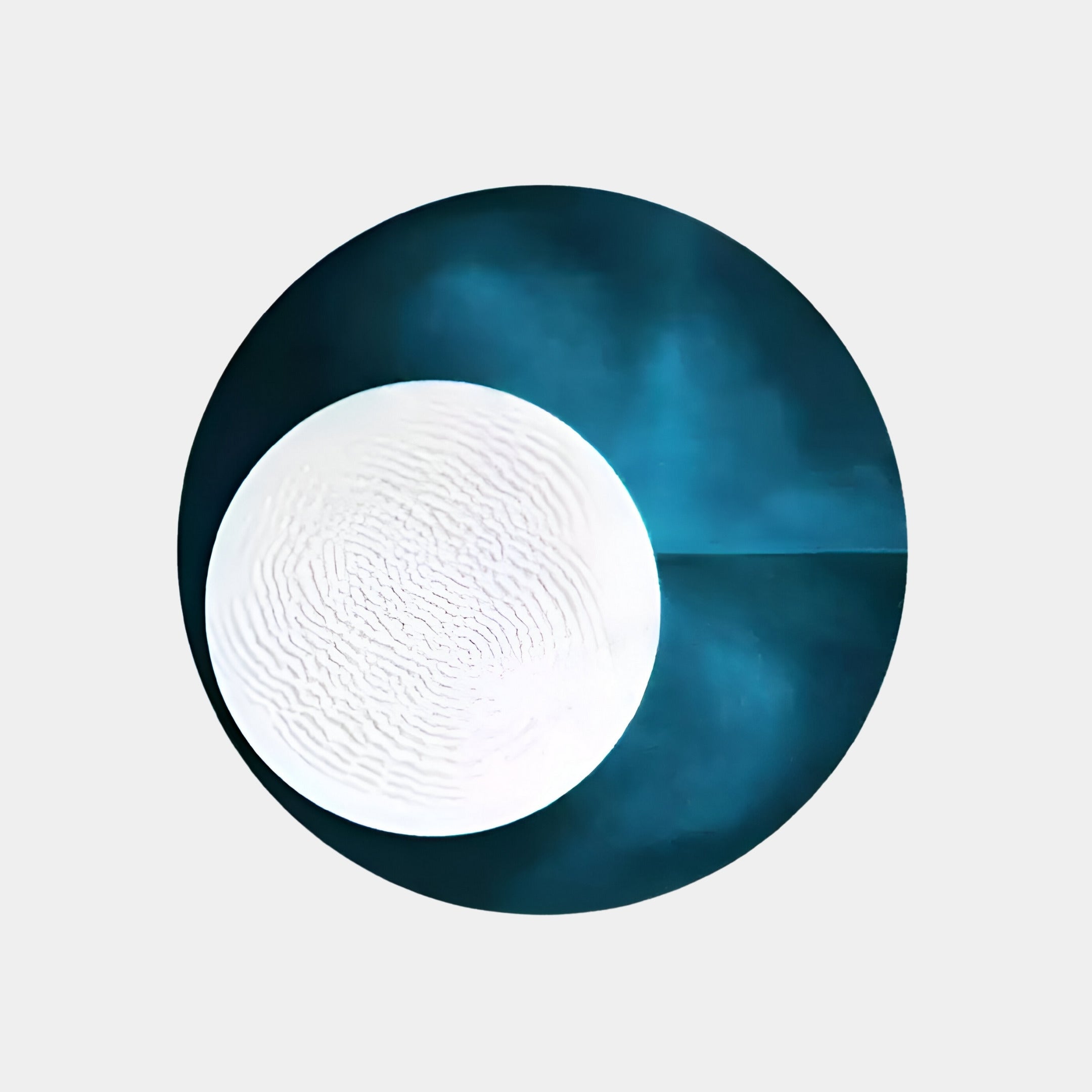 The Flaria Ocean 3D LED Wall Art by Giant Sculptures features a textured white sandstone-inspired disc on a dark teal base against a light gray background, creating an abstract geometric design that exudes minimalist elegance.