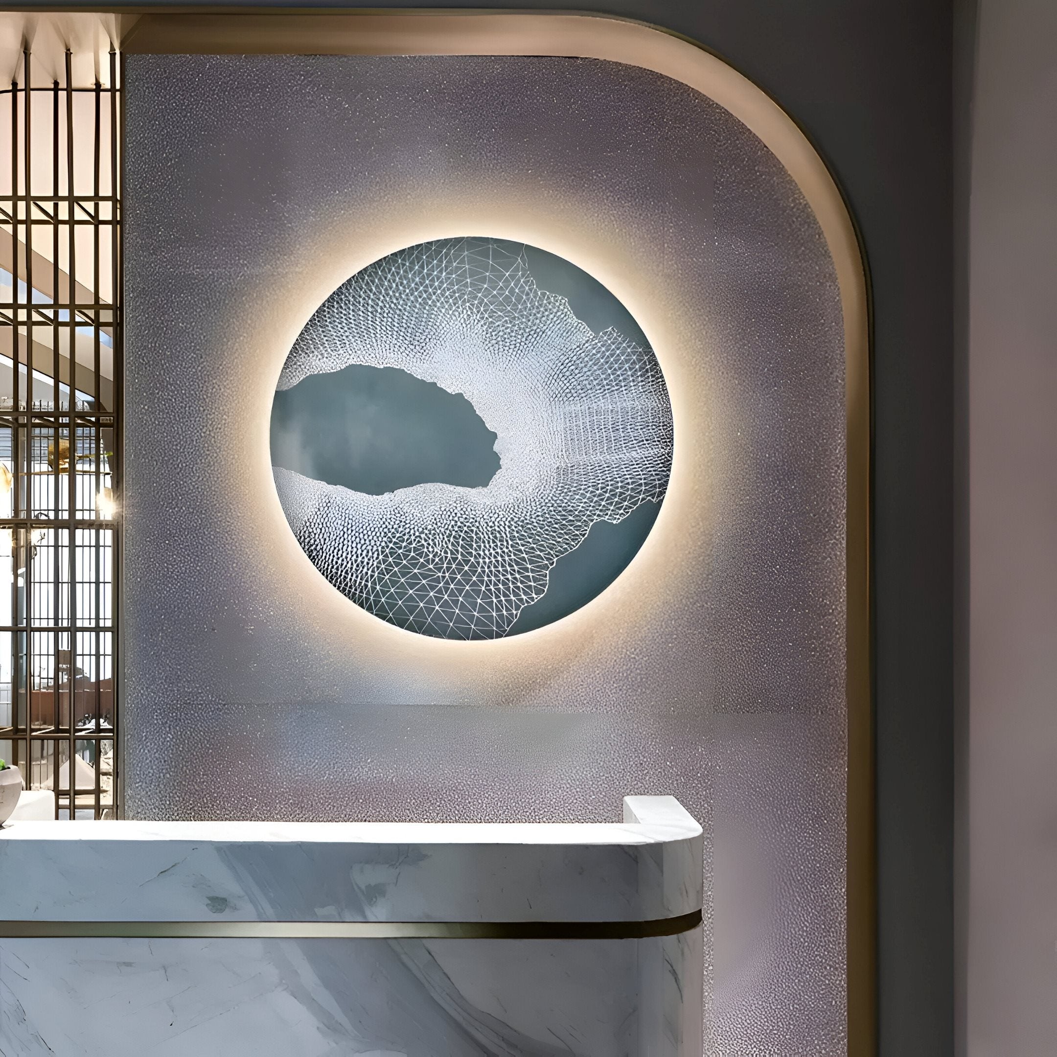 The Earthlight Midnight Mist LED Wall Art by Giant Sculptures showcases a modern circular design with a 3D textured oil painting and glowing rim, mounted on a textured wall. Complemented by a marble counter with gold accents and soft lighting, its ideal for contemporary interiors.