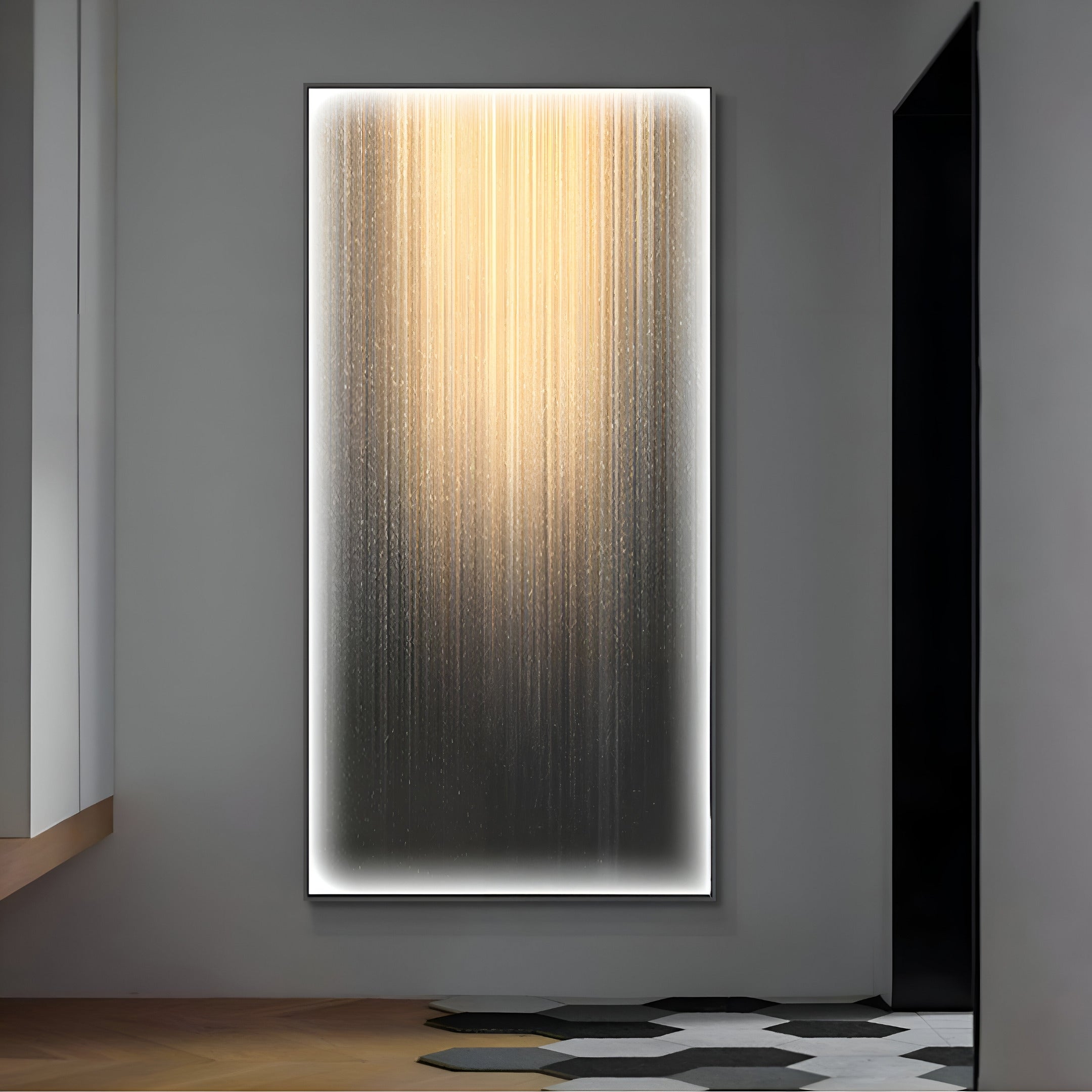 The Celeste Radiance Reflection LED Wall Art by Giant Sculptures adorns the wall with a vertical gradient of gold to black lines, resembling rain. Framed by a lit border, this piece enhances contemporary aesthetics in modern spaces, paired perfectly with geometric black and white flooring.