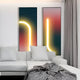 Dual LED wall art panels with bold gradient hues and curved light accents, adding a contemporary statement to living room interiors.