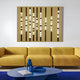 A modern living room showcases a mustard yellow sofa, a blue coffee table with blue decor accents, and the Strata Gold LED Wall Art by Giant Sculptures highlighting vertical light patterns. A plush blue rug ties the luxurious interior together.