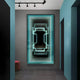 In a modern hallway, the Horizon Endless Horizon 3D LED Mirror Wall Art by Giant Sculptures displays glowing teal concentric rectangles, creating a mesmerizing infinite depth. The dark-tiled floor complements the sleek design, while a track light fixture illuminates from above.