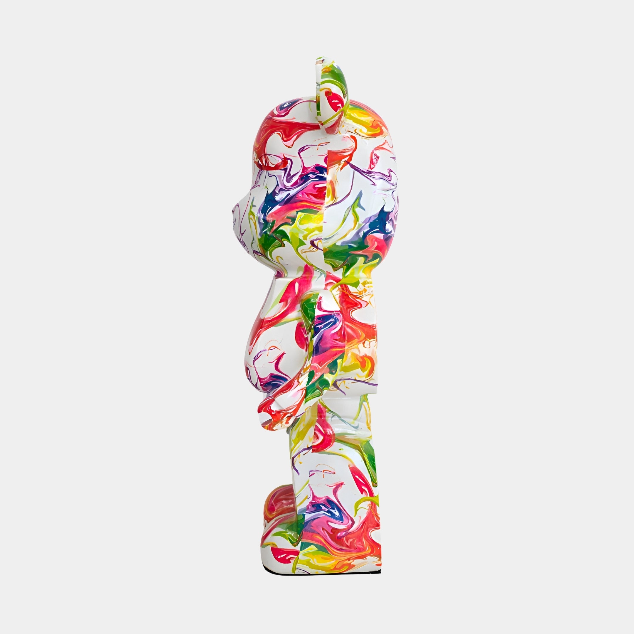 Angled view of Vogue Bear Sculpture, highlighting the bold abstract patterns for a contemporary art statement.