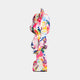 Angled view of Splatter Bear Sculpture, emphasizing the vivid colors and abstract patterns on a modern sculpture.