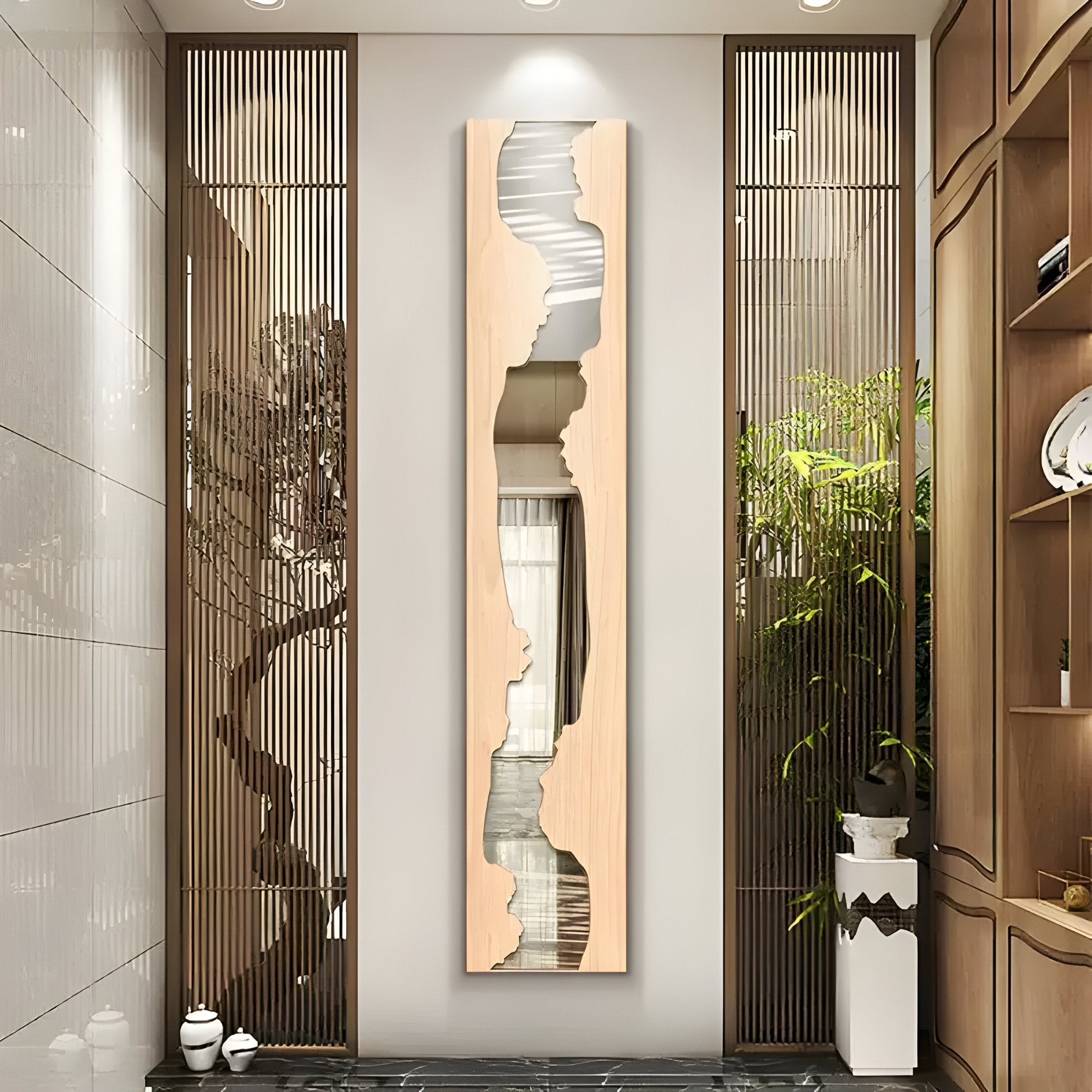 The modern hallway features the Stratara Beige Wood Carving Mirror Linear Wall Art by Giant Sculptures, epitomizing contemporary style. Flanked by decorative wooden screens and shelves with books and potted plants, the space maintains a clean, minimalist aesthetic enhanced by soft lighting.