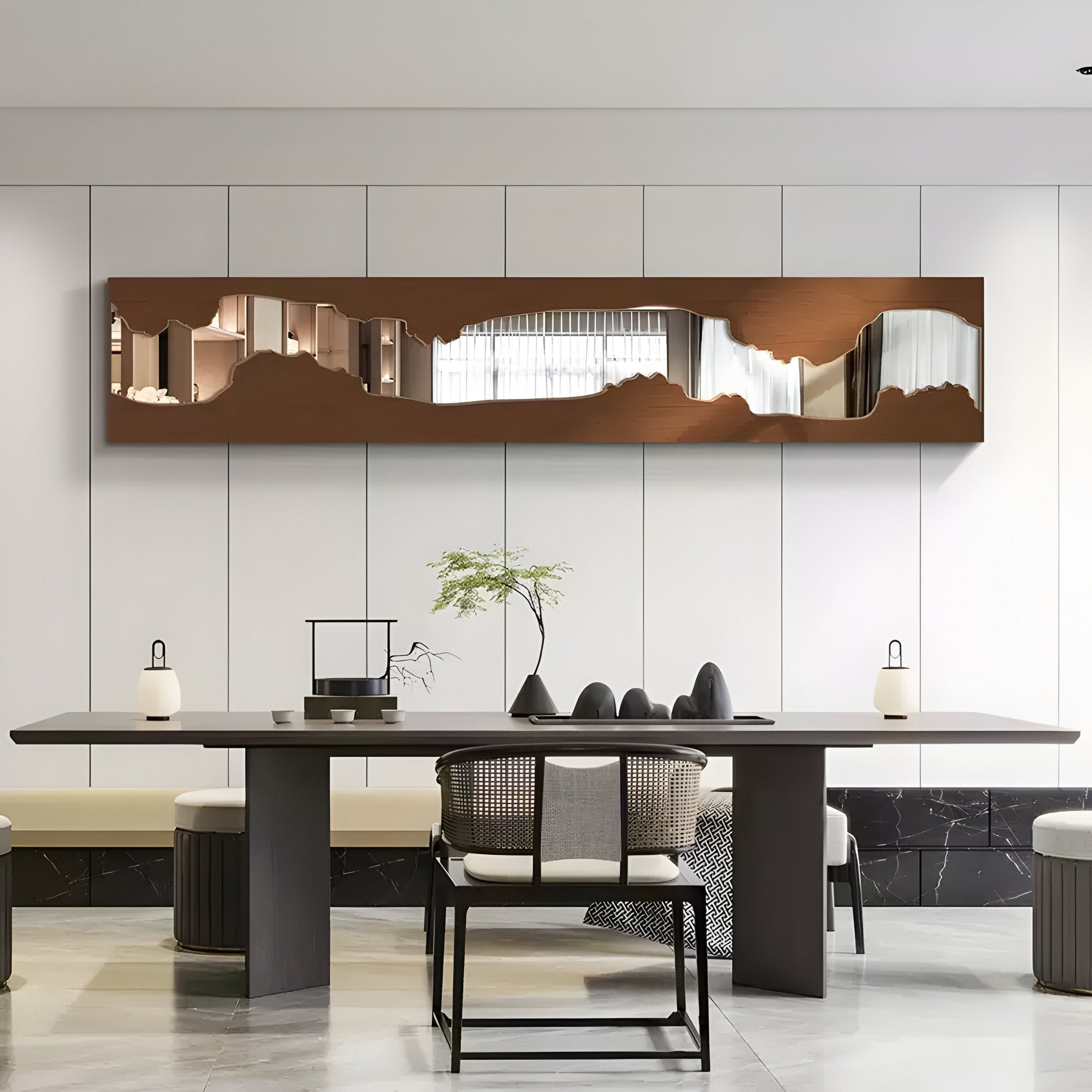 A modern dining room features a sleek black table, chairs, and minimalist design. The Stratara Dark Brown Wood Carving Mirror Linear Wall Art by Giant Sculptures is mounted on the white wall for elegance. A small plant and minimalistic lamps complete the decor.