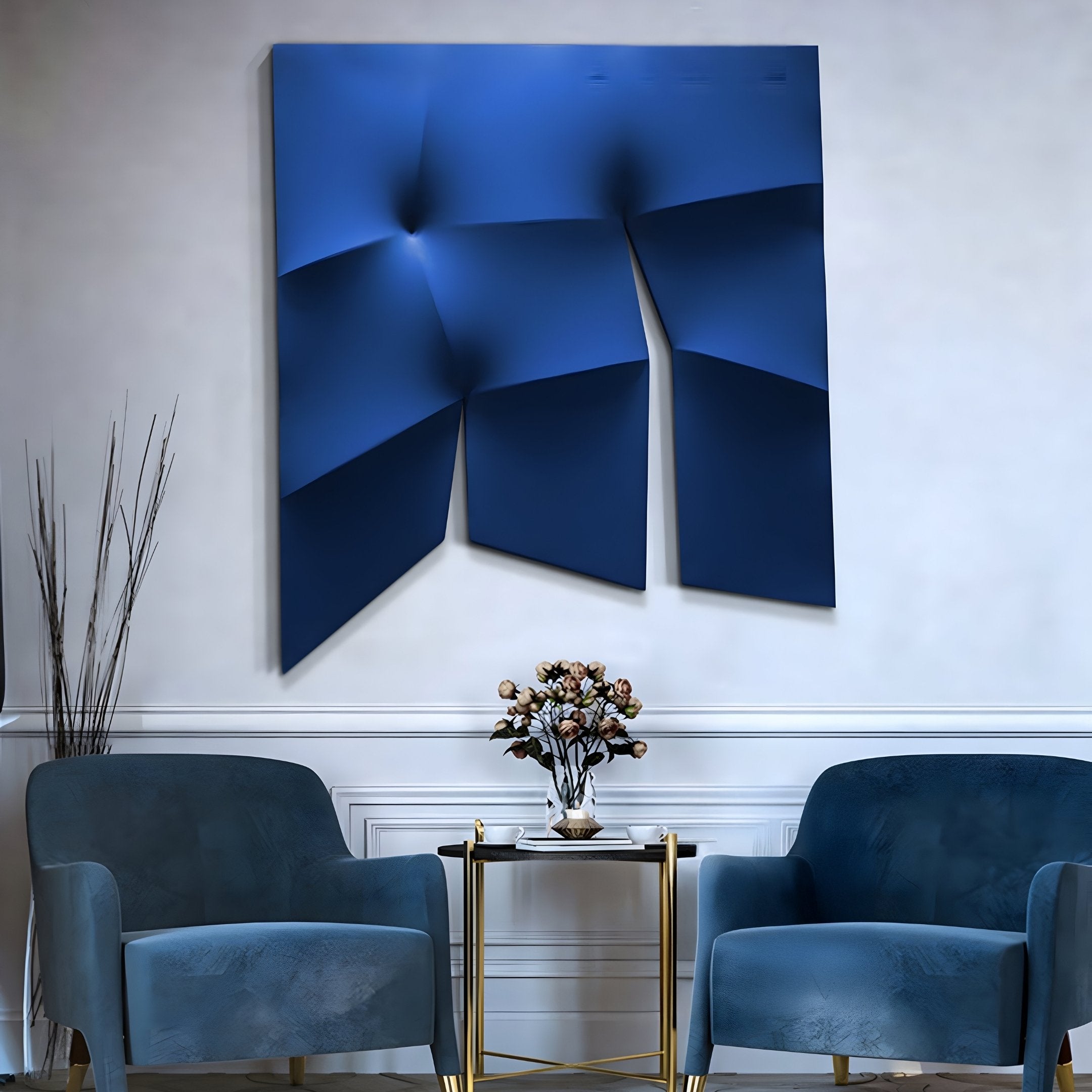 A modern living room showcases two blue armchairs and a small glass table with flowers, adorned with the Contours Dynamic Blue Elastic Fabric 3D Wooden Wall Art by Giant Sculptures above the chairs, enhancing the contemporary minimalist decor.