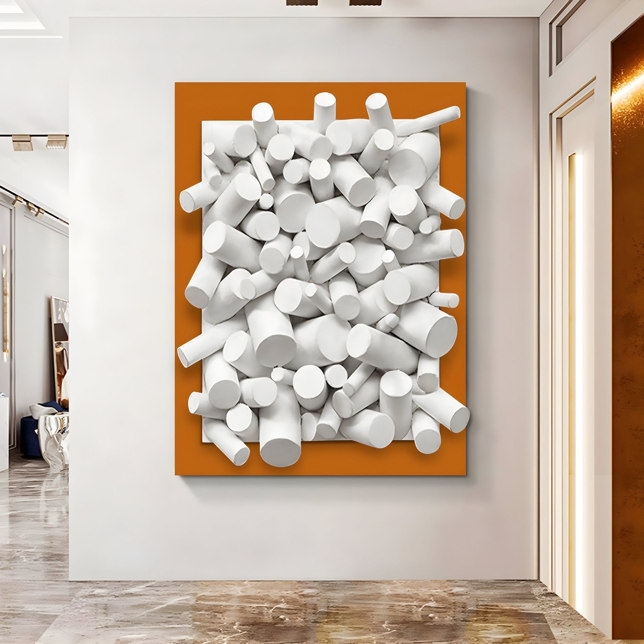 The Giant Sculptures Axion 3D Wall Art features a white wood cluster against a burnished orange edge, elegantly displayed in a modern room with sleek marble flooring.