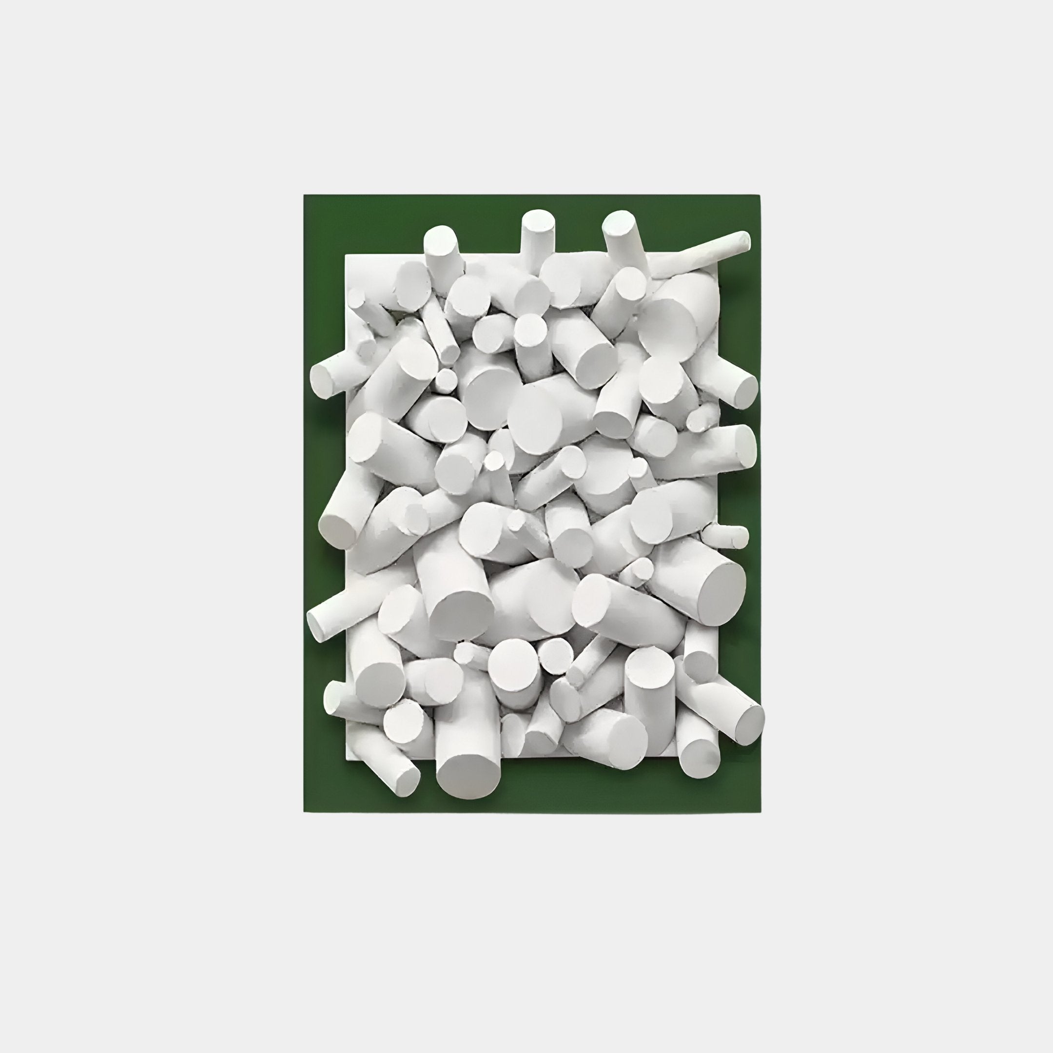 The Axion White Wood Cluster & Emerald Green Edge 3D Wall Art by Giant Sculptures features geometric white cylindrical shapes clustered on an emerald green edge, creating a visually intriguing piece.