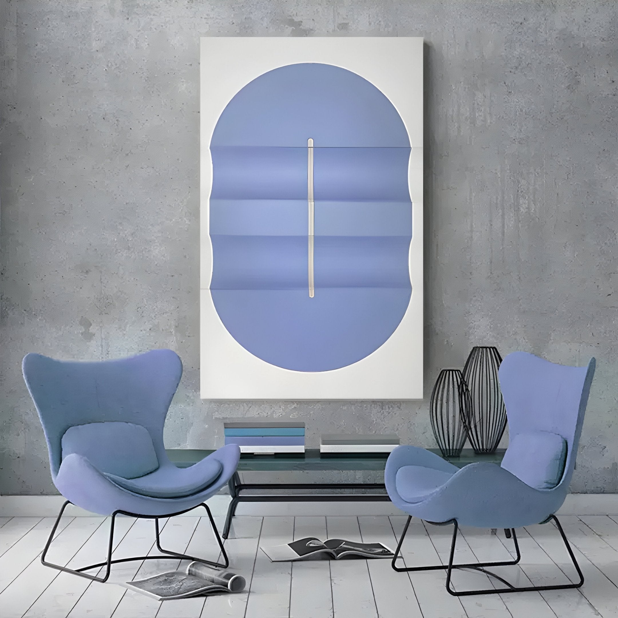 Two modern blue armchairs face each other in a minimalist room with a textured gray wall. A large Ellipse Lavender Oval Wood 3D canvas wall art by Giant Sculptures, hangs above a glass table with decorative vases. An open book on the floor adds to the calming interior.