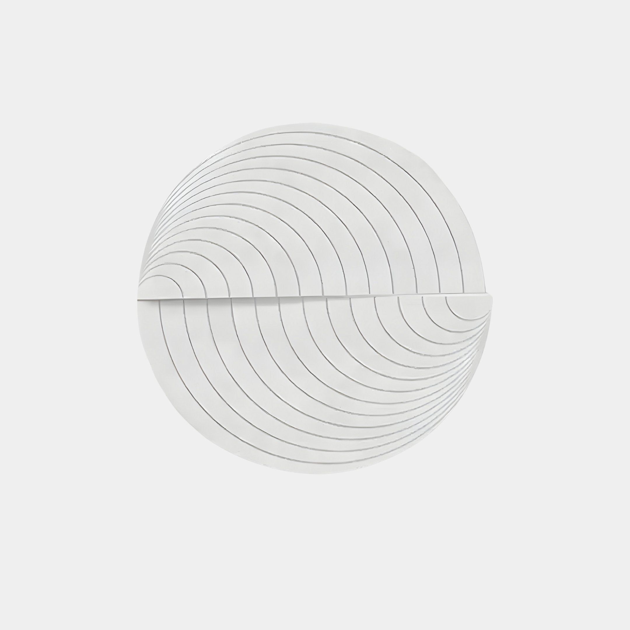 The Orbitals White Circular Wood Carved Sandstone 3D Wall Art by Giant Sculptures features concentric arcs in a symmetrical, wave-like design on a white background, offering minimalist elegance with its serene sandstone finish.