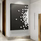 The Fragmenta White Wooden Cube Scatter On Black Canvas 3D Wall Art by Giant Sculptures embodies contemporary minimalism. Featuring small white cubes clustering on the right and scattering left, its perfect for monochromatic interiors with its striking visual flow against a pristine white wall.