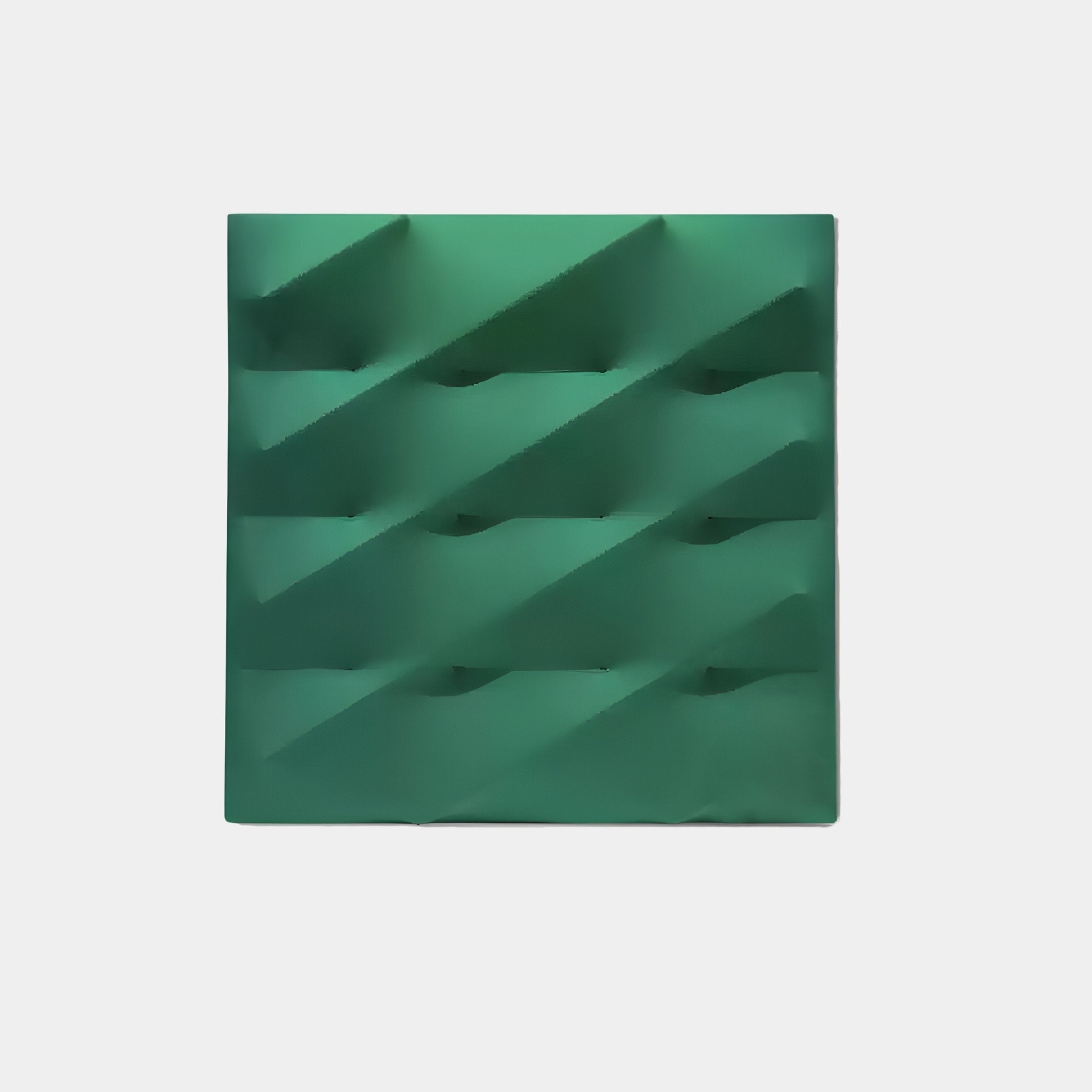 The Verto Emerald Green Stretch Fabric Layered Wooden 3D Wall Art by Giant Sculptures features diagonal grooves and ridges on a geometric square panel, creating a standout minimalist design against a plain white background for striking visual intrigue.