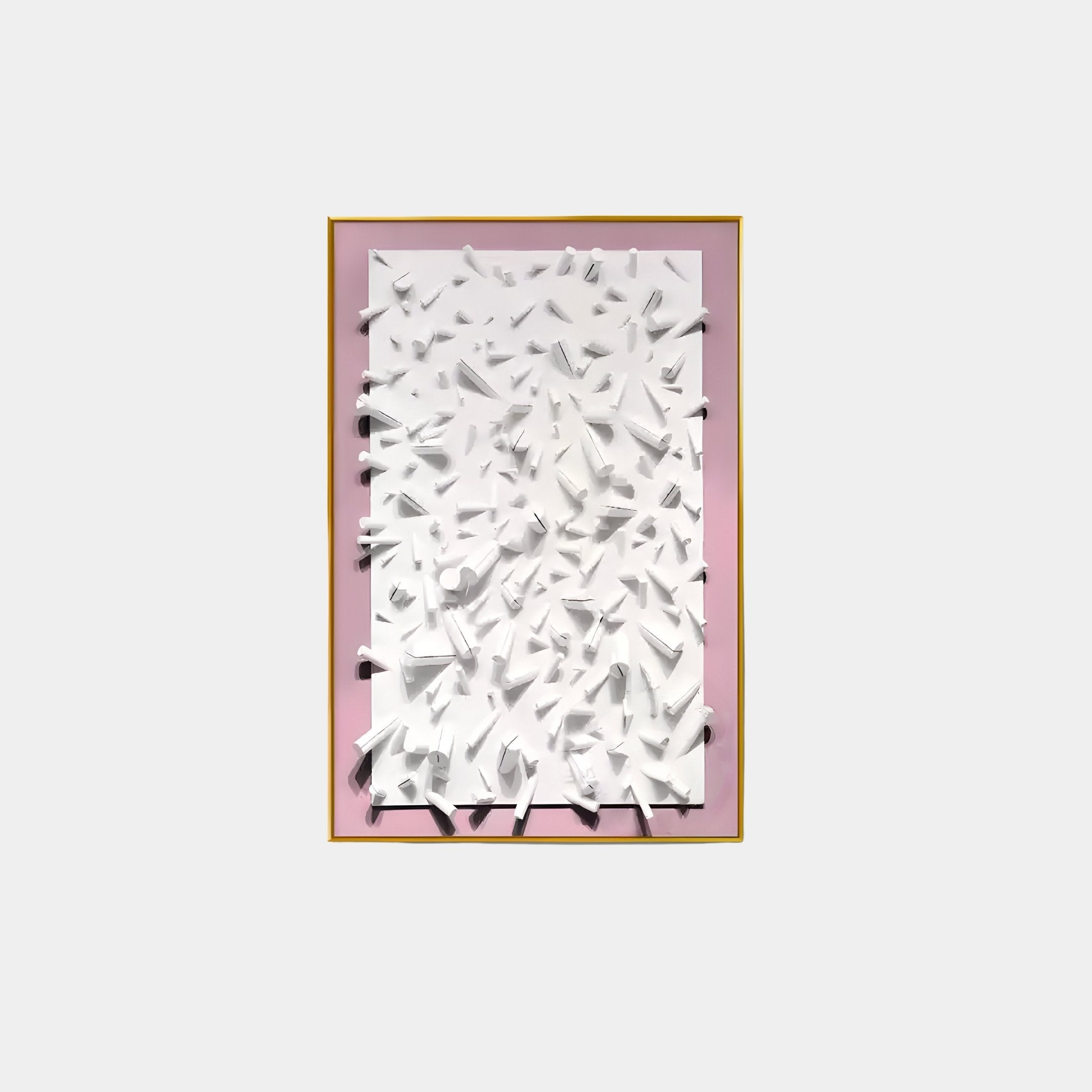 The Artiora Pink Edge & White Abstract Wooden Shard 3D Wall Art by Giant Sculptures features paper-like, textured white shapes that protrude and overlap on a light pink background, all elegantly enclosed in a simple gold frame.