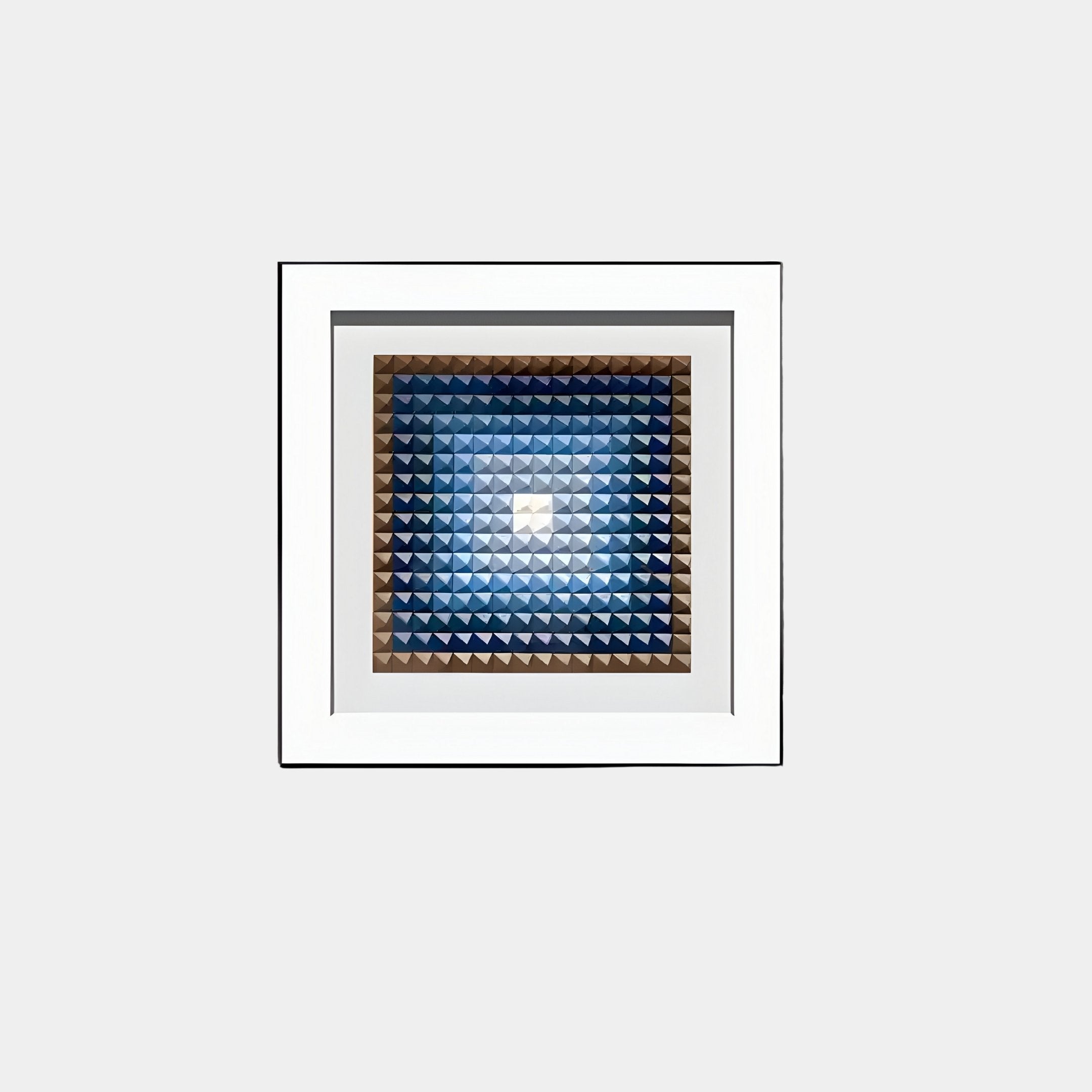 The Viretta Blue Gradient Pyramid Textured 3D Wooden Wall Art by Giant Sculptures features a framed geometric square pattern with blue gradient triangles forming a tunnel-like vortex effect, transitioning from dark to light towards the center—perfect for contemporary spaces.