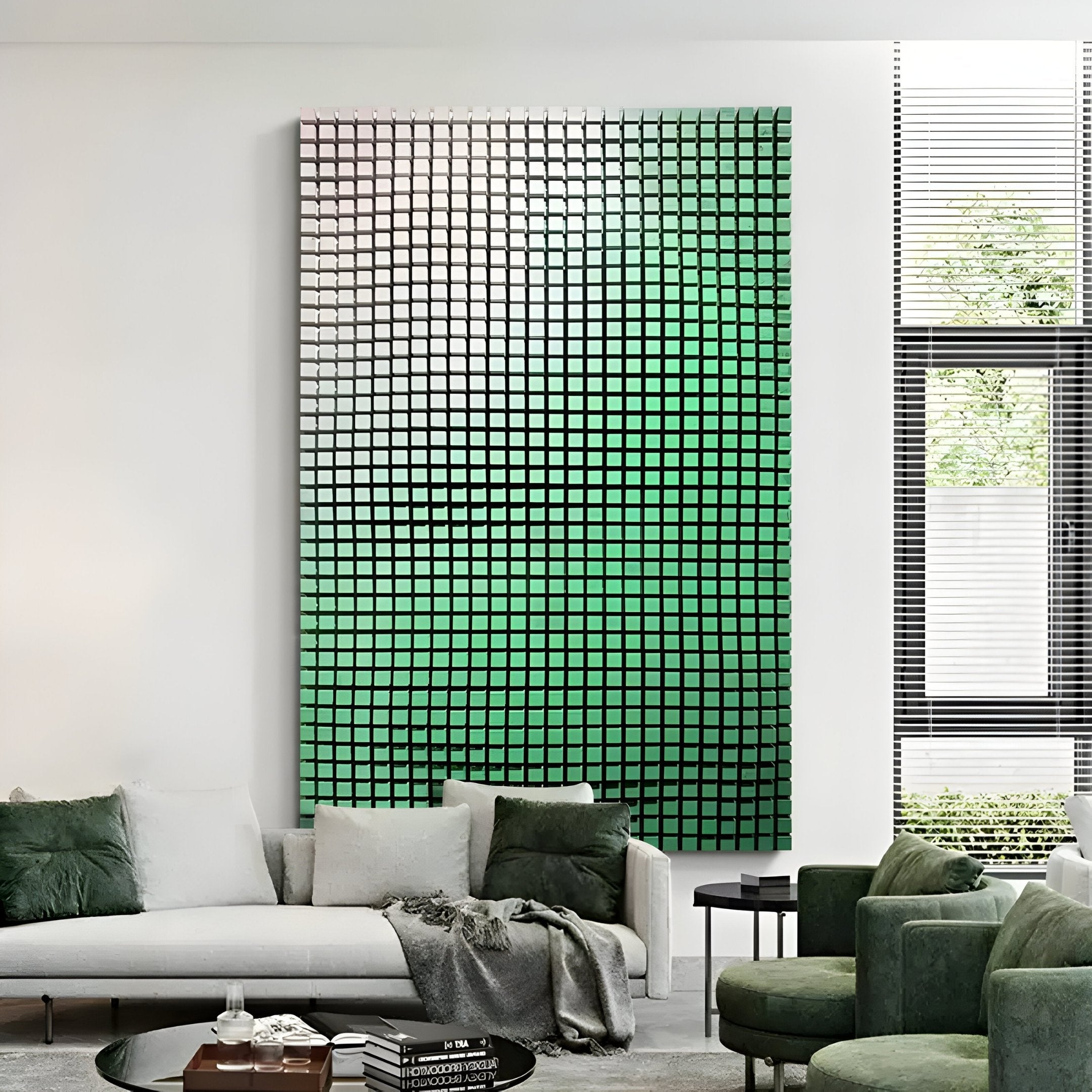 In a modern living room, a white sofa with green pillows and a green blanket takes center stage. A Reflexion Green Gradient Cube Mosaic 3D Wooden Wall Art by Giant Sculptures adds geometric precision above. Natural light floods in through a large window with blinds, accentuating the chic decor.