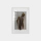 The Illusive Standing Figure Wood Carving 3D Wall Art by Giant Sculptures presents a blurred human figure behind vertical blinds, creating an abstract effect. The obscured outline on a plain, light background adds intrigue and modern flair to any interior.