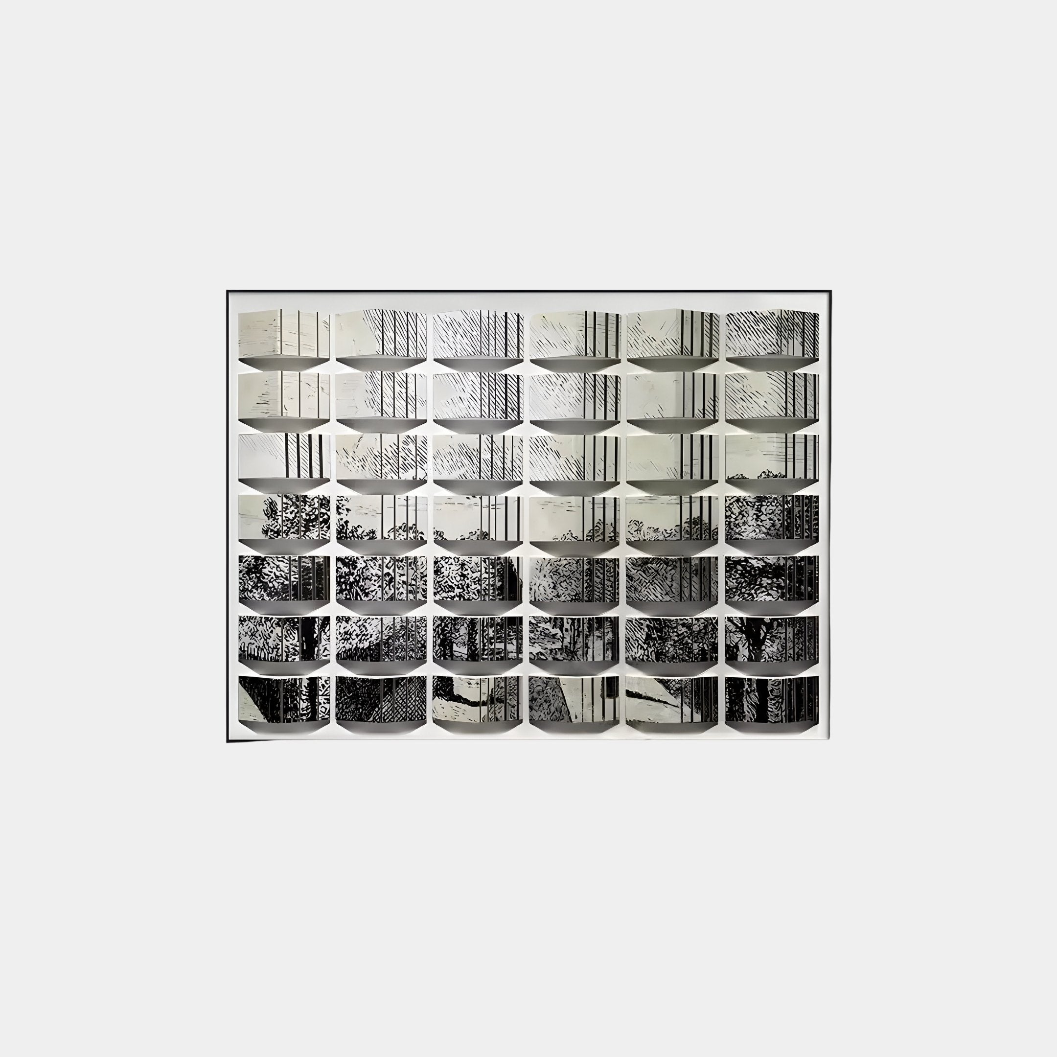 The Muraluxe Monochrome Landscape Curved Mosaic 3D Wooden Wall Art by Giant Sculptures showcases a grid of unique black and white abstract patterns, each with distinctive textures and lines on a light background.