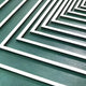 Giant Sculptures Prismalux Green Wood Carving is a hand-painted 3D wall art featuring white geometric lines forming parallel, angled rectangles on a teal background, creating a layered optical illusion effect.